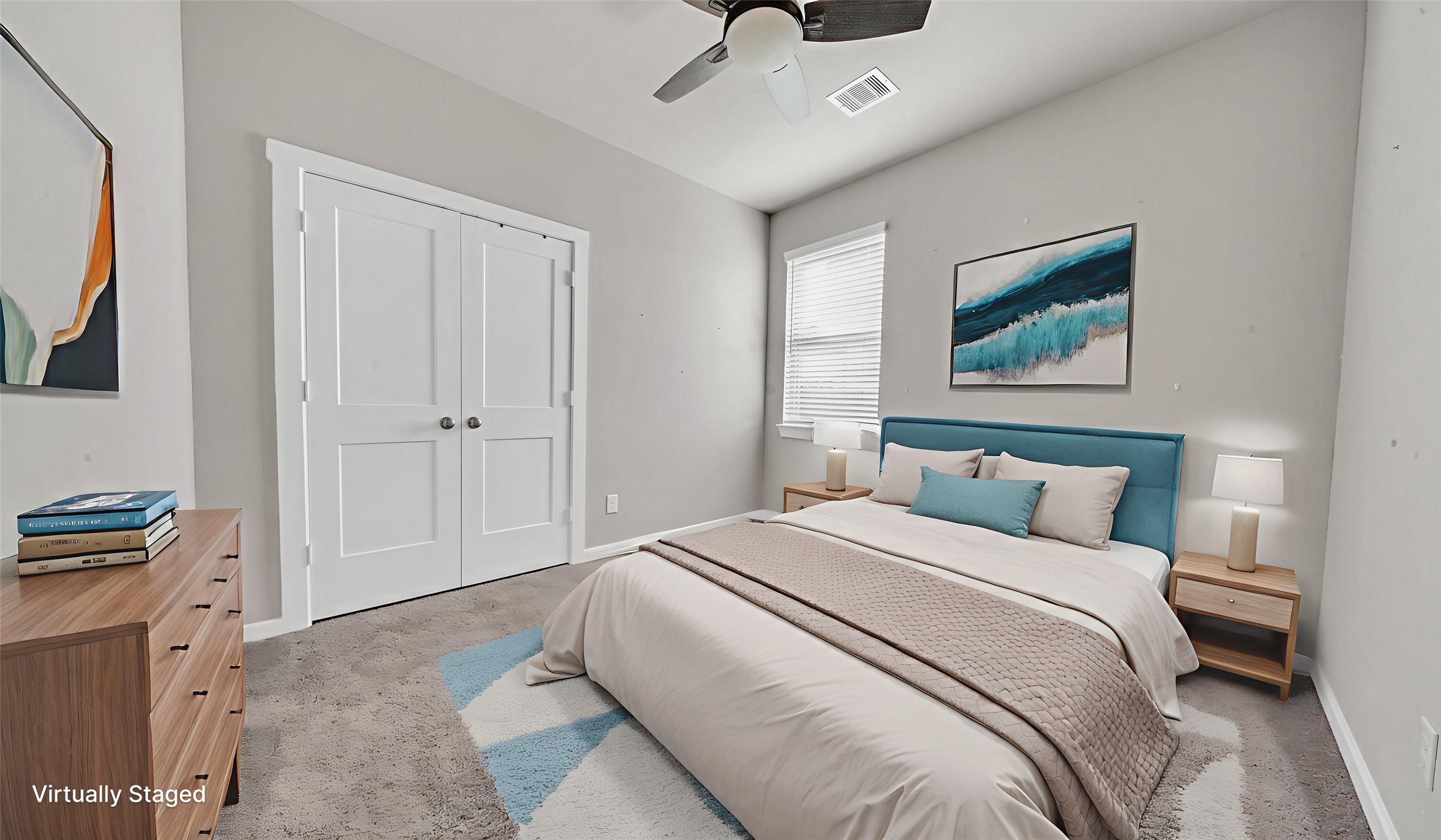 Bright secondary bedroom virtually staged to show layout potential, featuring a large closet and neutral tones.
