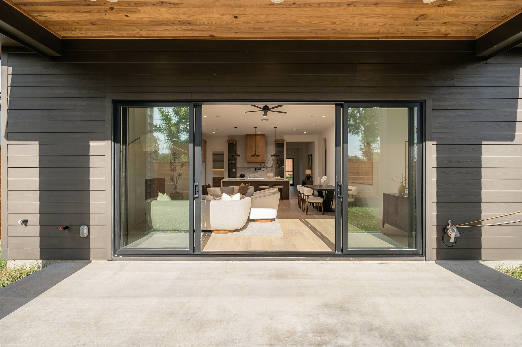 The covered patio extends the living experience outdoors, complete with a gas connection and pre-wiring for speakers for effortless entertaining year-round.