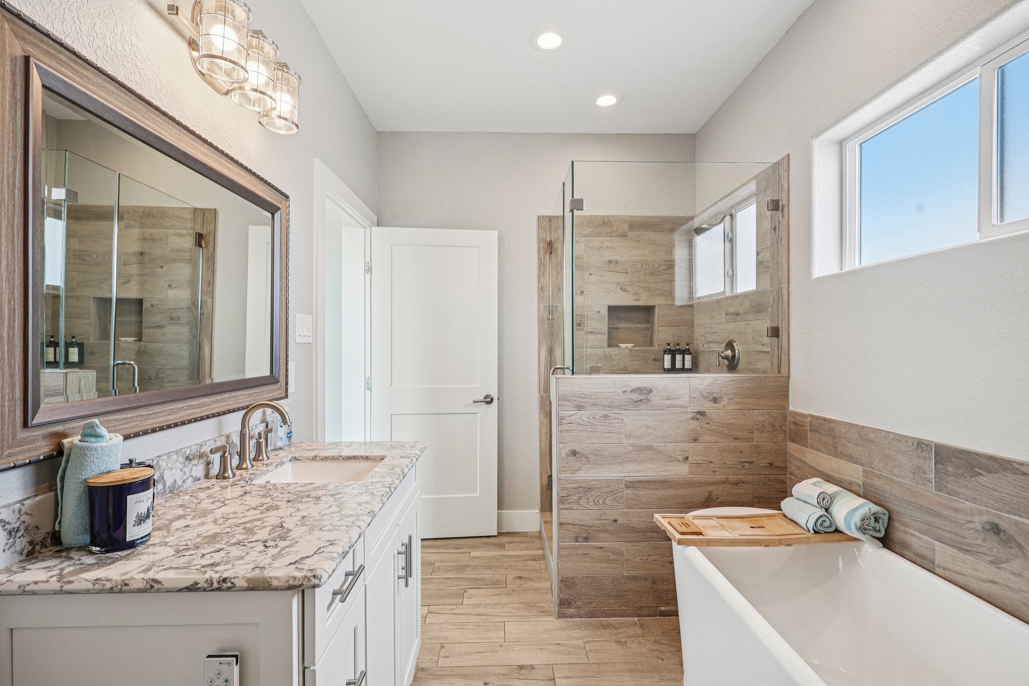 Elegant bathroom with decorative tub & shower