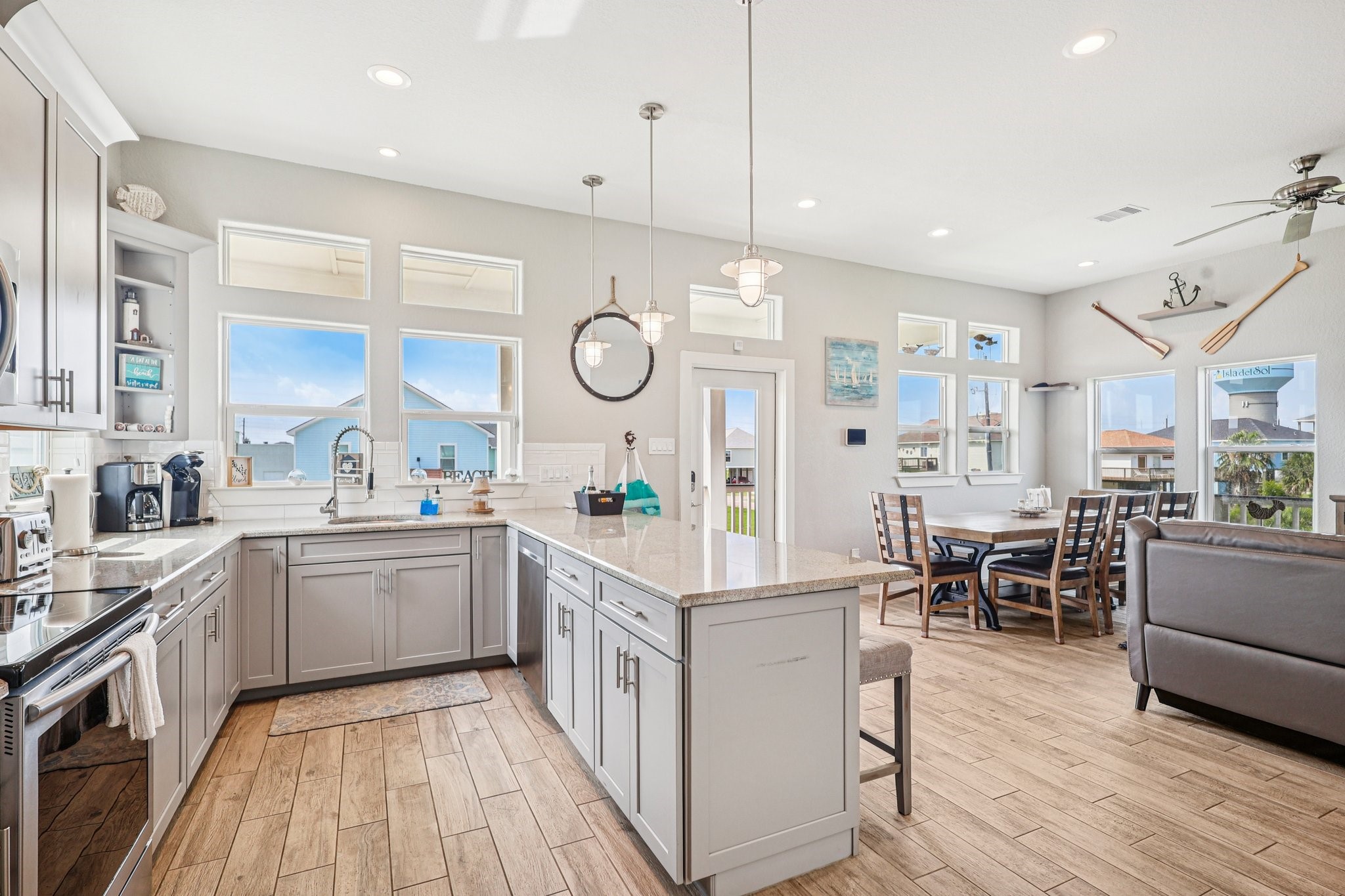 Large modern kitchen with lots of
 countertop space.