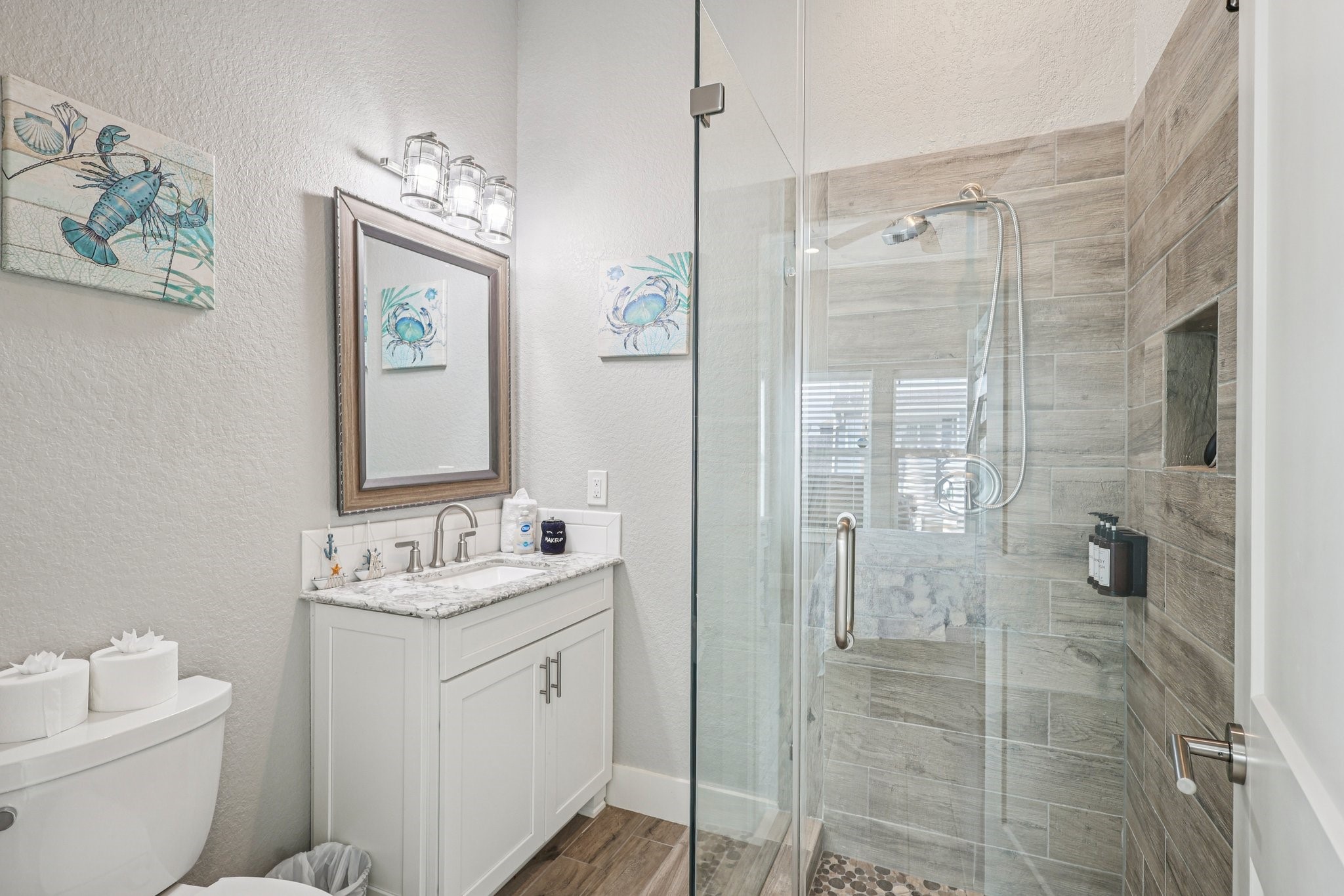 Modern En Suite bathroom with
 granite countertops