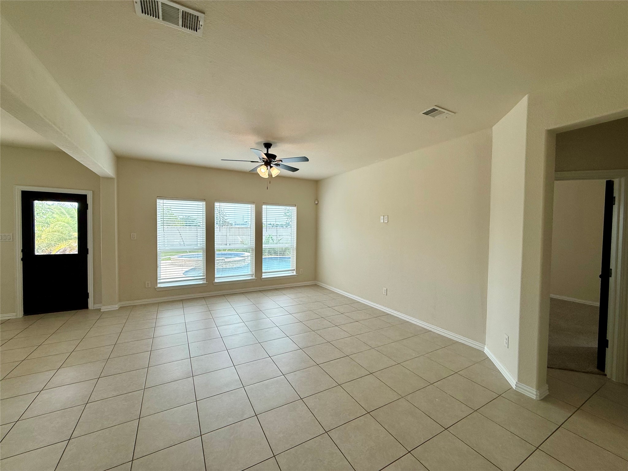 Family room with nice view of pool
