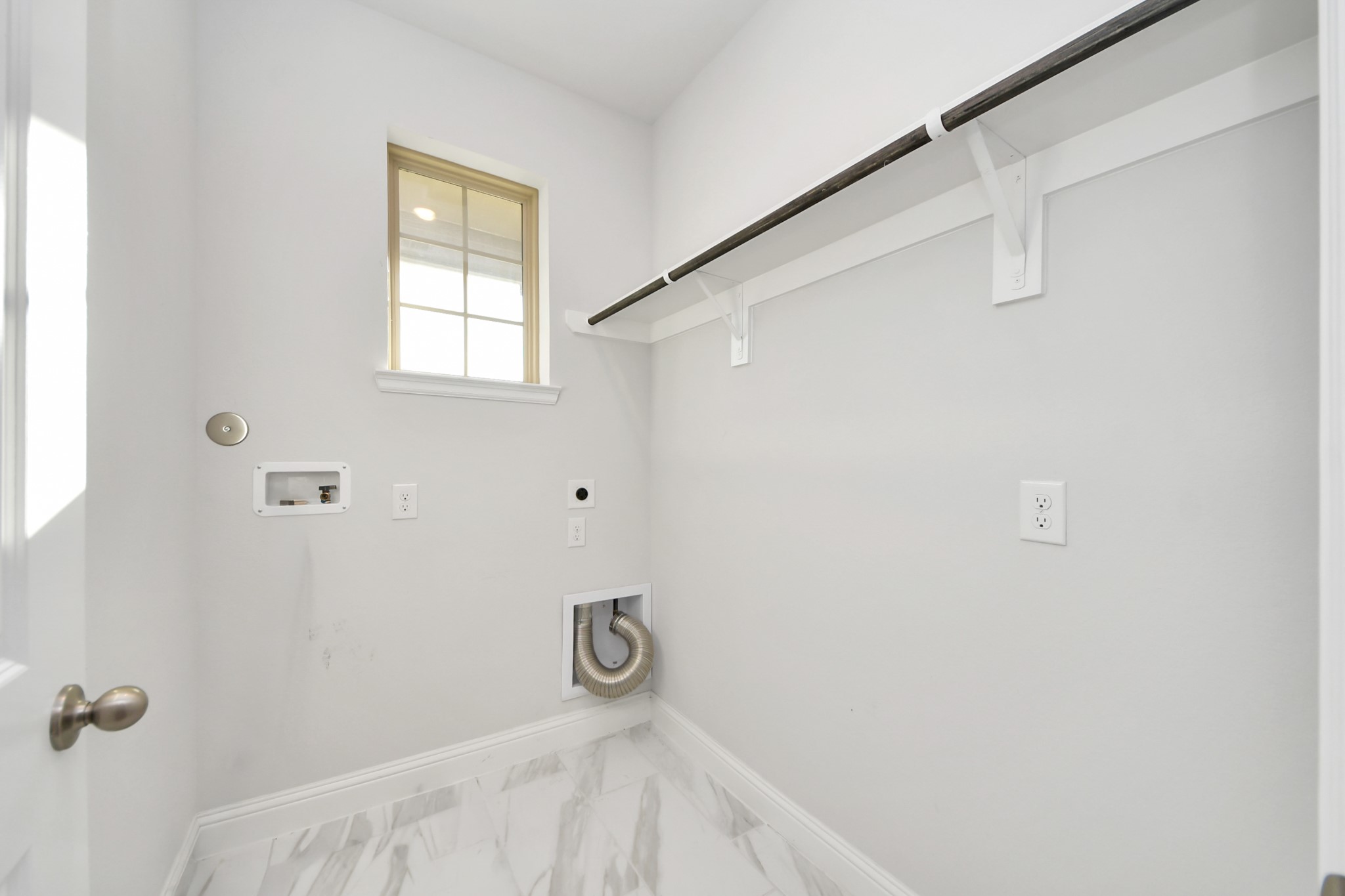 Laundry room just located near the entrance.