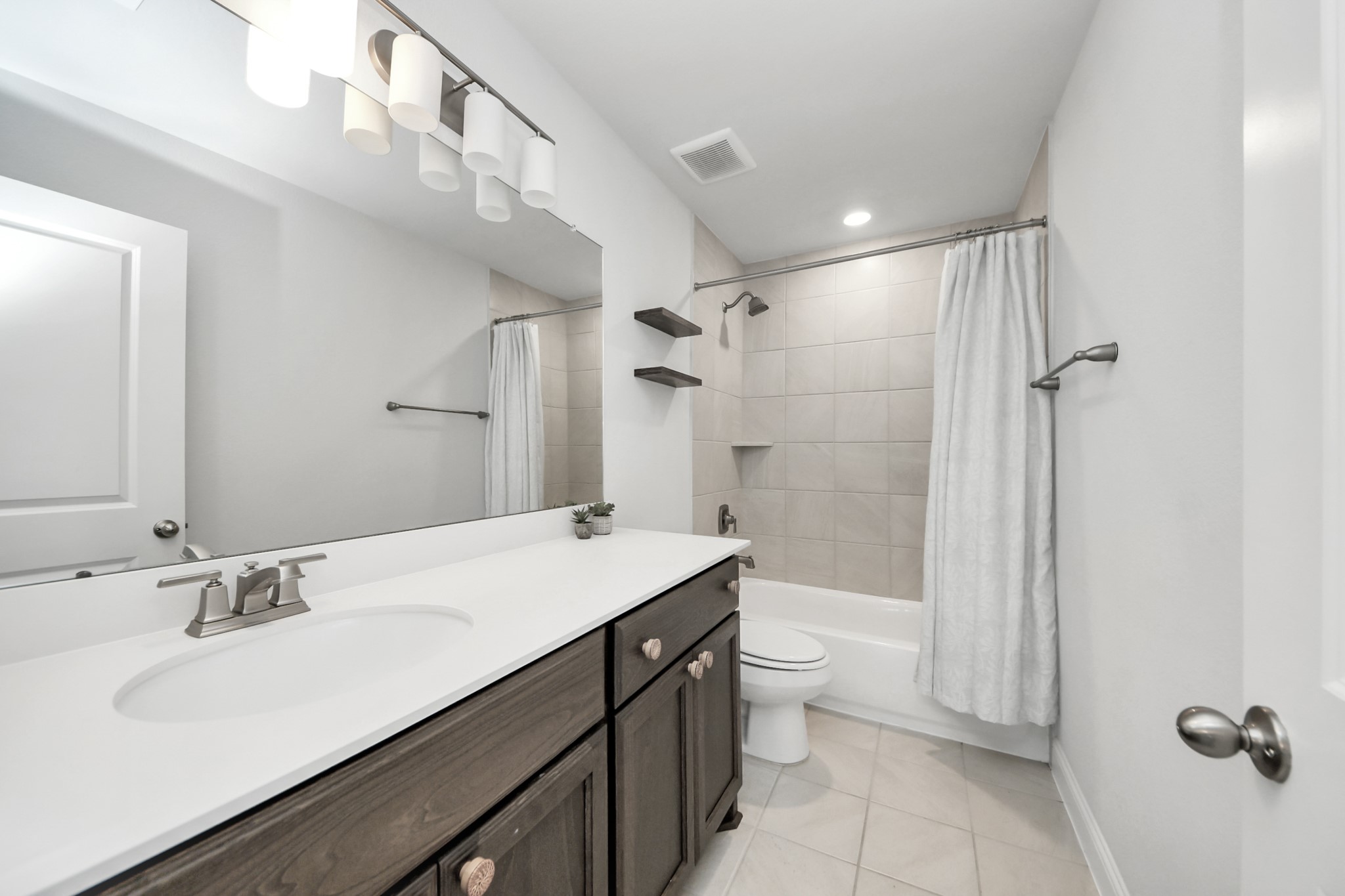 Second-floor secondary bathroom.