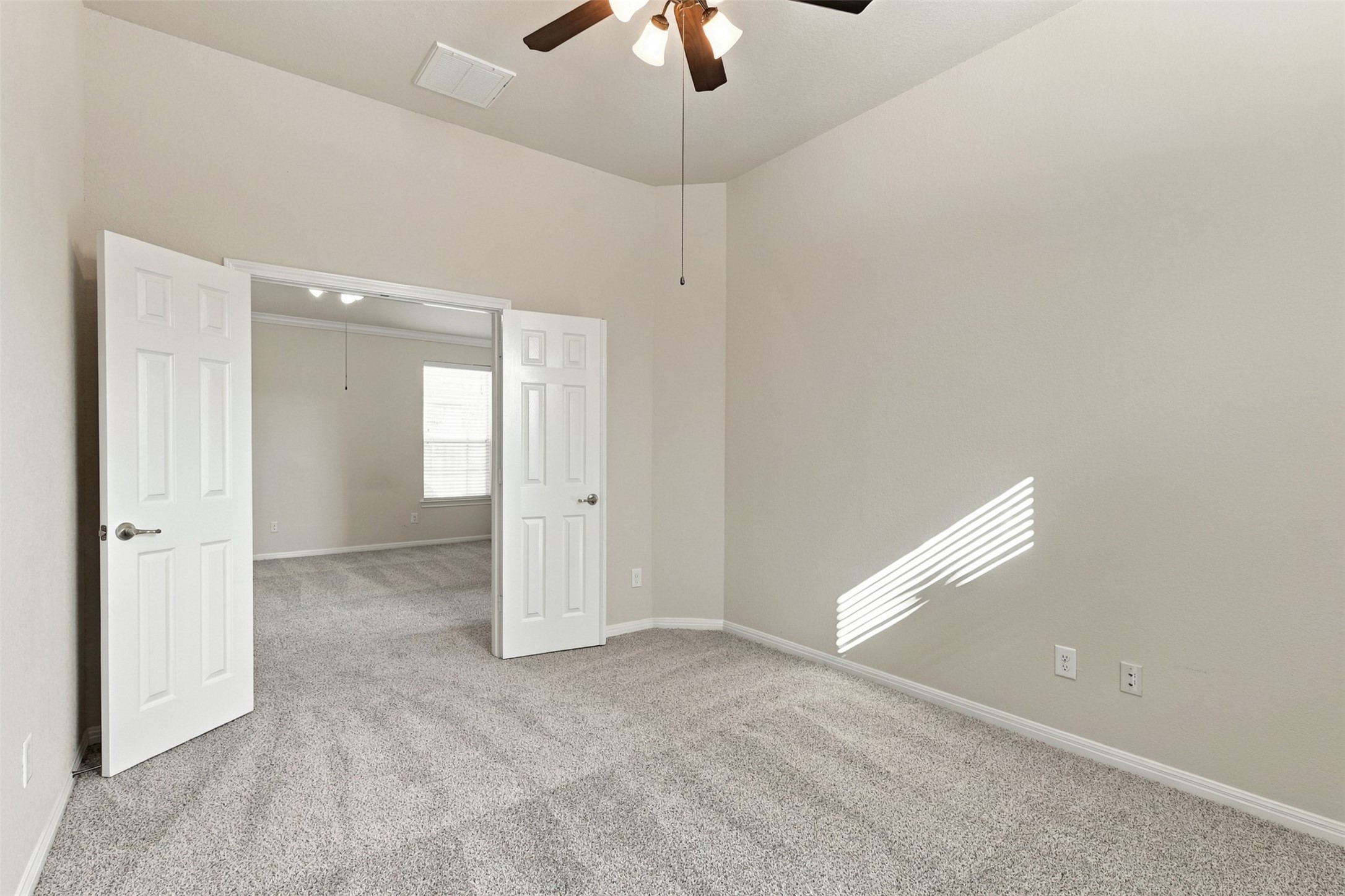 Another view of the flex room with double door entry.