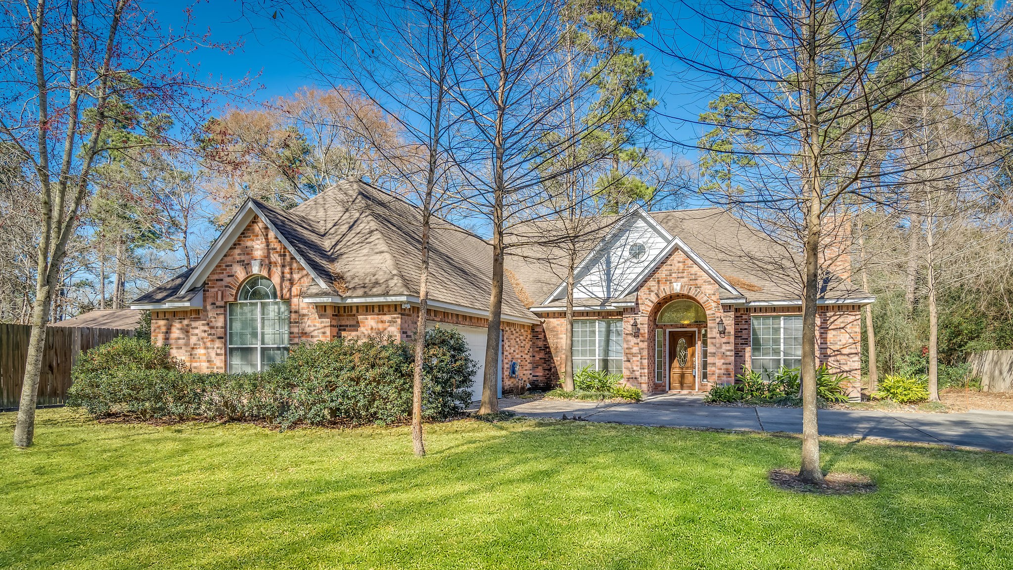 Charming one-story home offering the perfect blend of convenience near The Woodlands and tranquility close to Lake Conroe