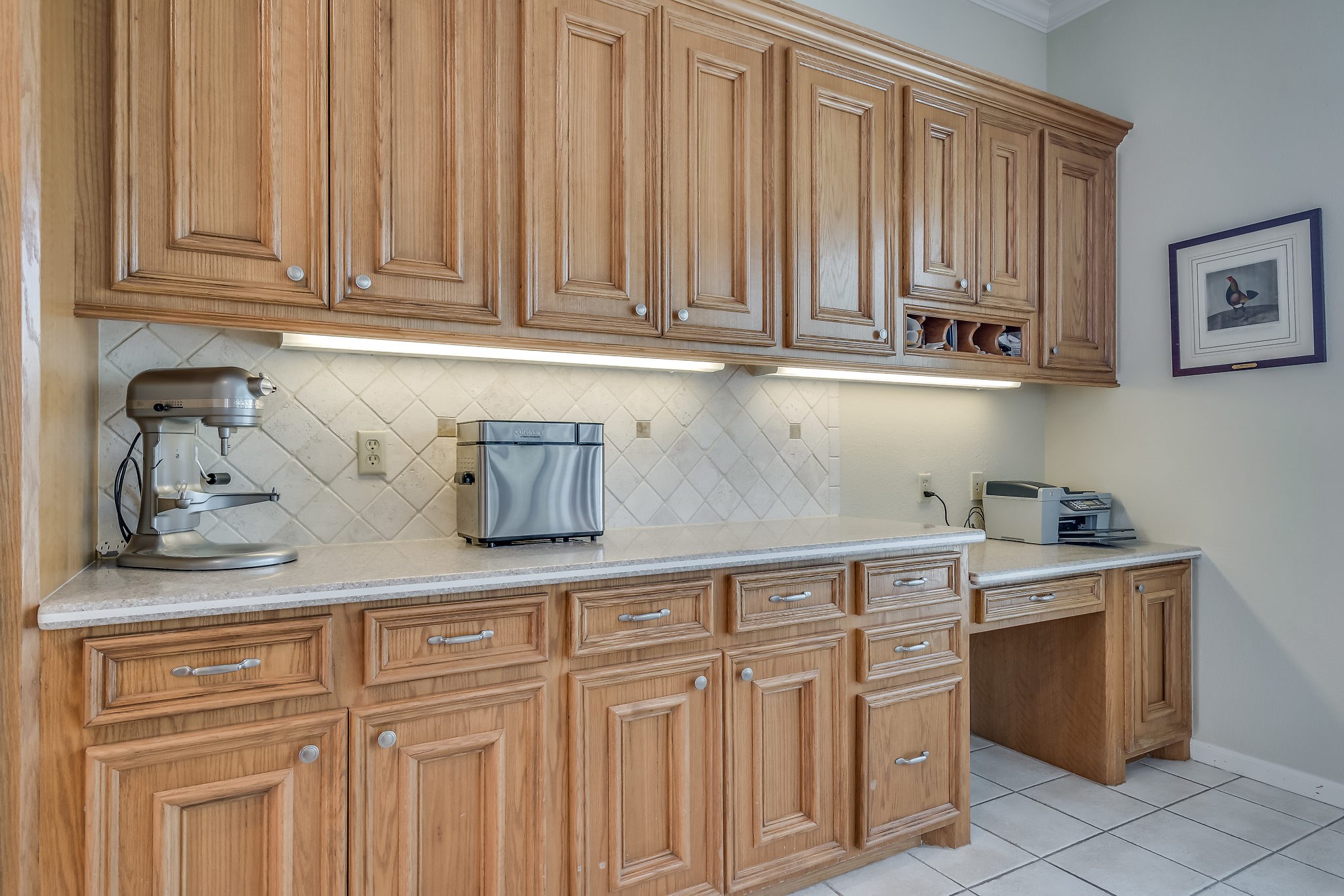 This kitchen offers abundant countertop space and beautiful cabinetry, perfect for culinary enthusiasts and organization lovers alike