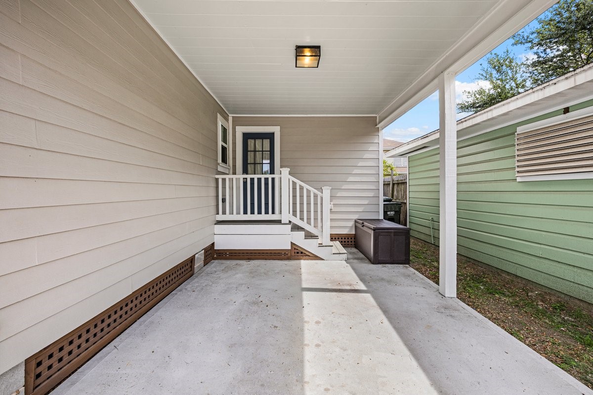 Covered Carport area with 2nd entrance right off the kitchen