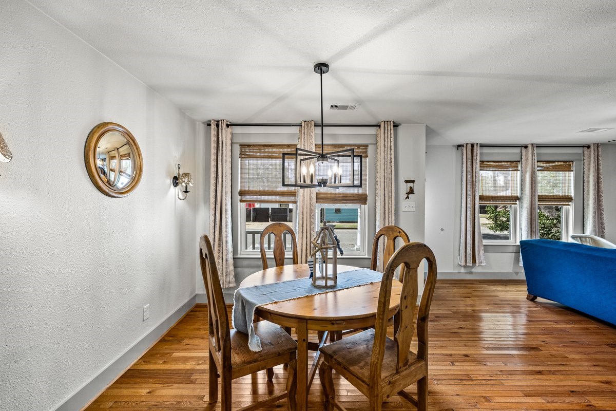 Tastefully selected light fixtures add character and style throughout this beautifully remodeled Galveston home.