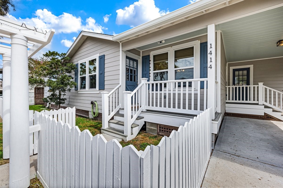 Charming white picket fence adds timeless curb appeal