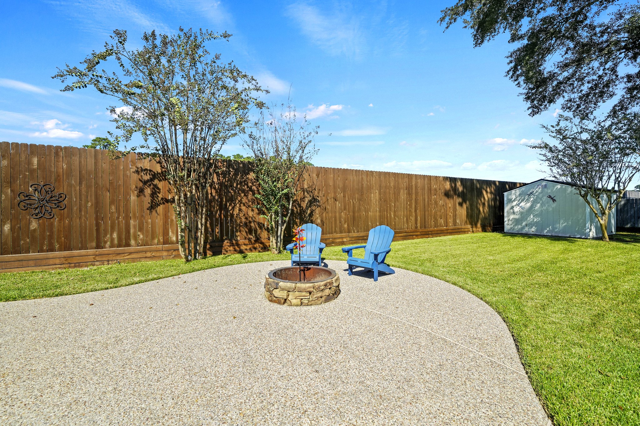 Inviting backyard fire pit.