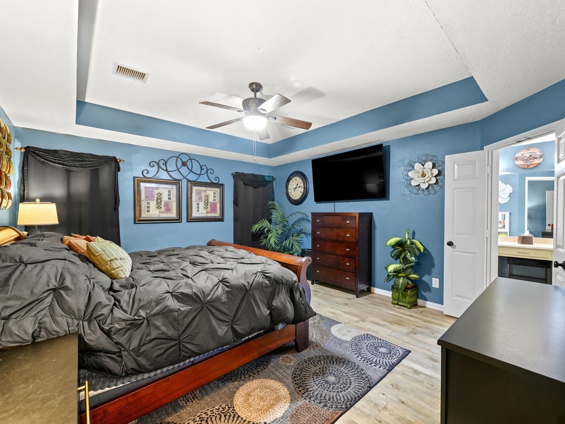 Serene primary bedroom suite.