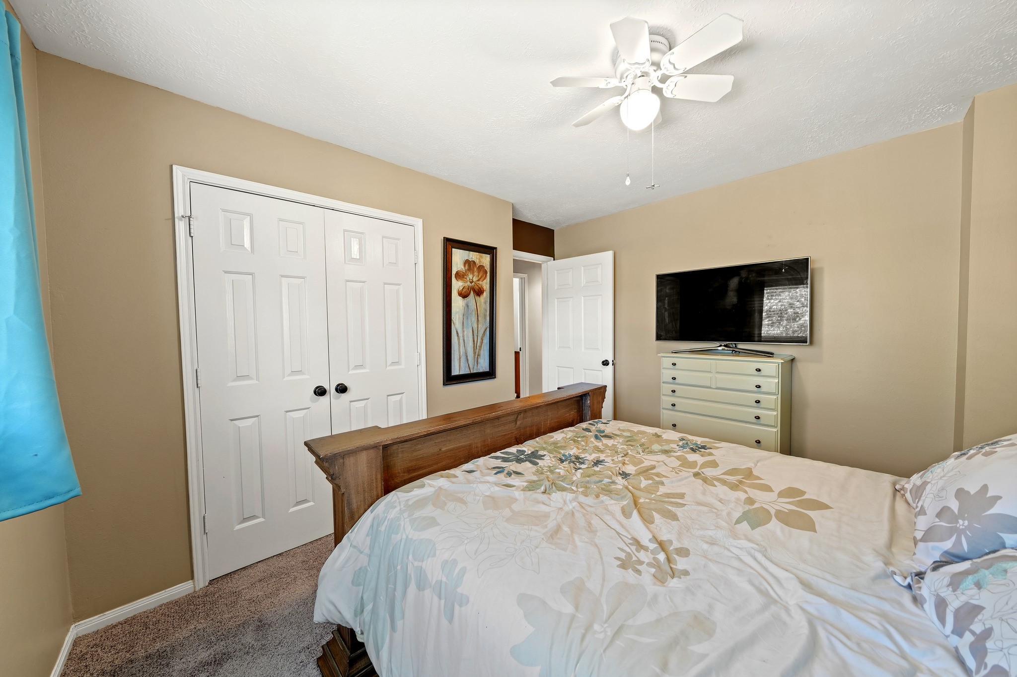 Inviting bedroom with double-door closet. Virtually staged.