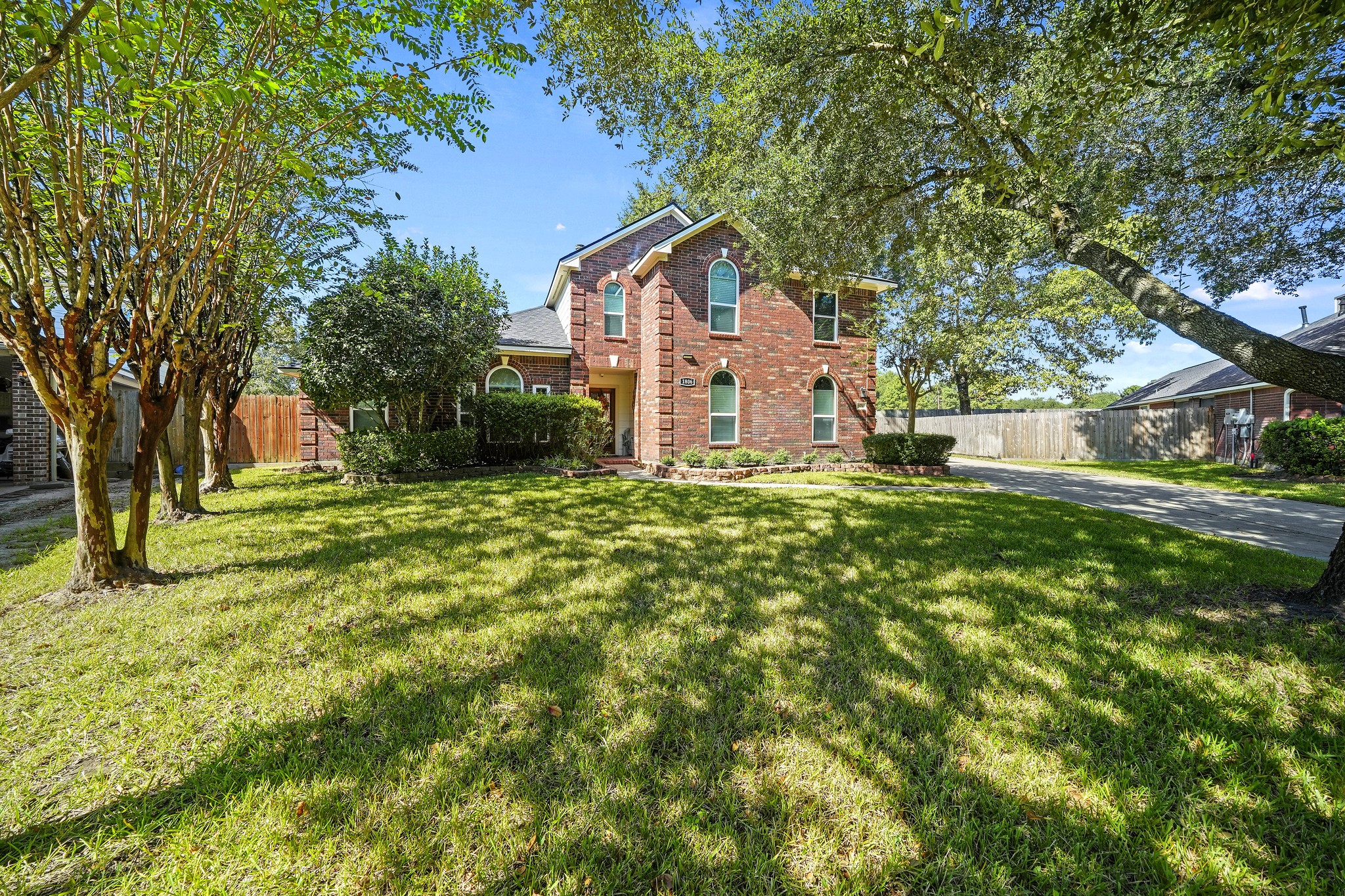 Stately front exterior on a manicured lot.