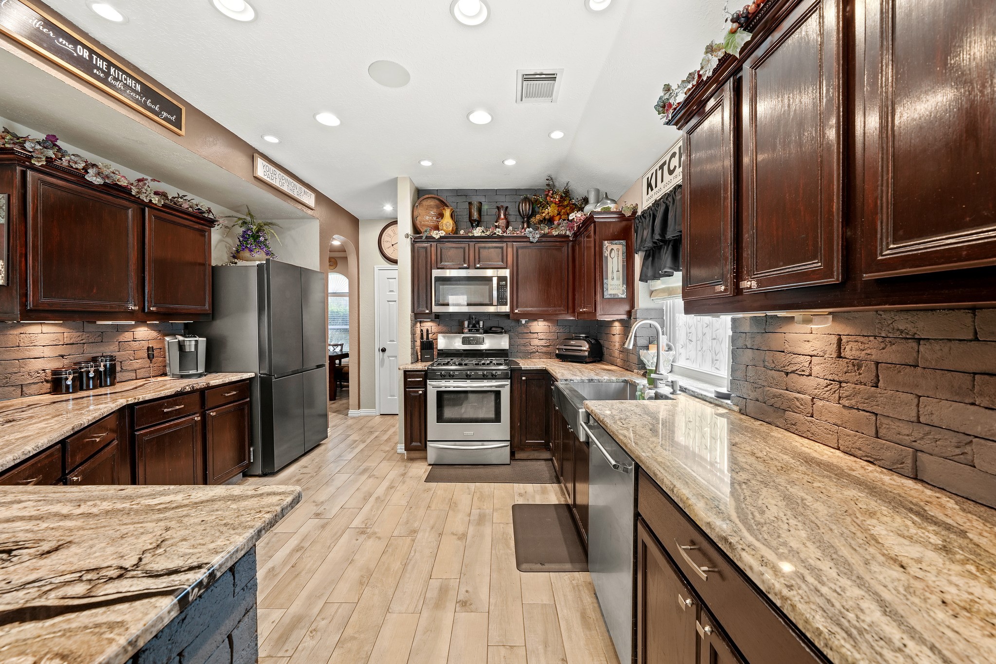 Kitchen with abundant cabinetry and storage.