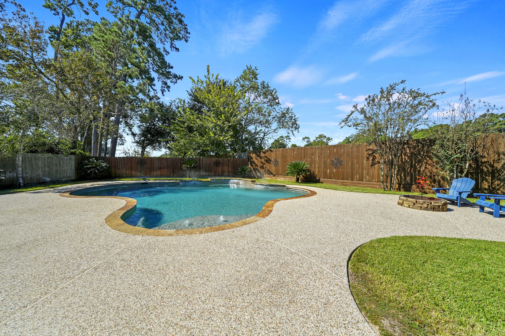 Sparkling free-form pool and deck.