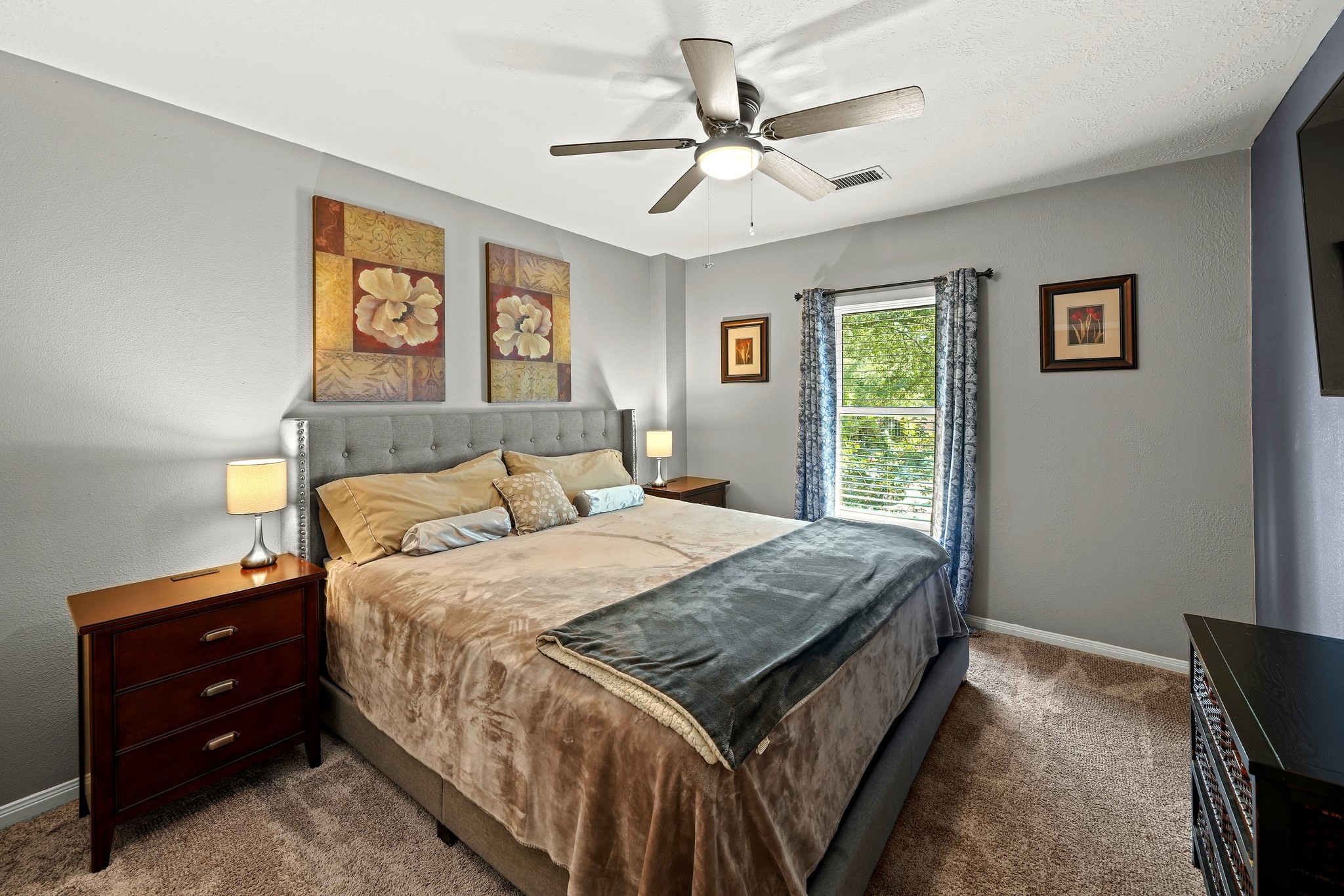 Bright and airy secondary bedroom.