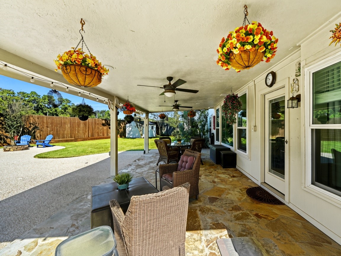 Shaded covered patio overlooking the yard.