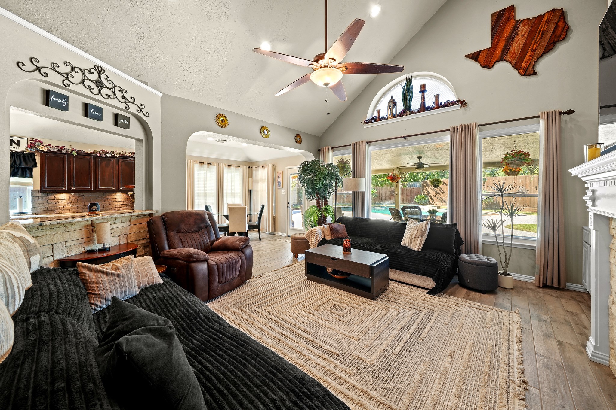 Sun-drenched living room with lofty ceilings.