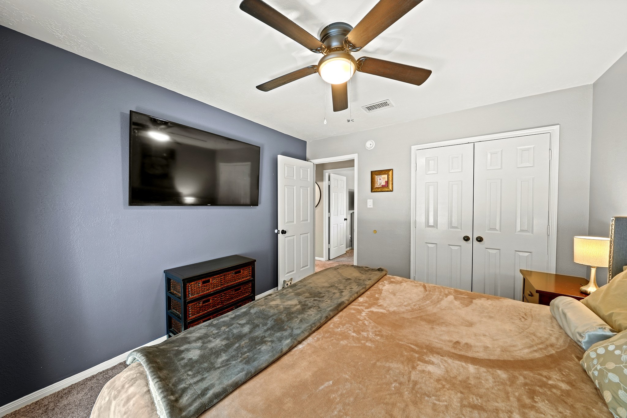 Spacious bedroom with a generous closet.
