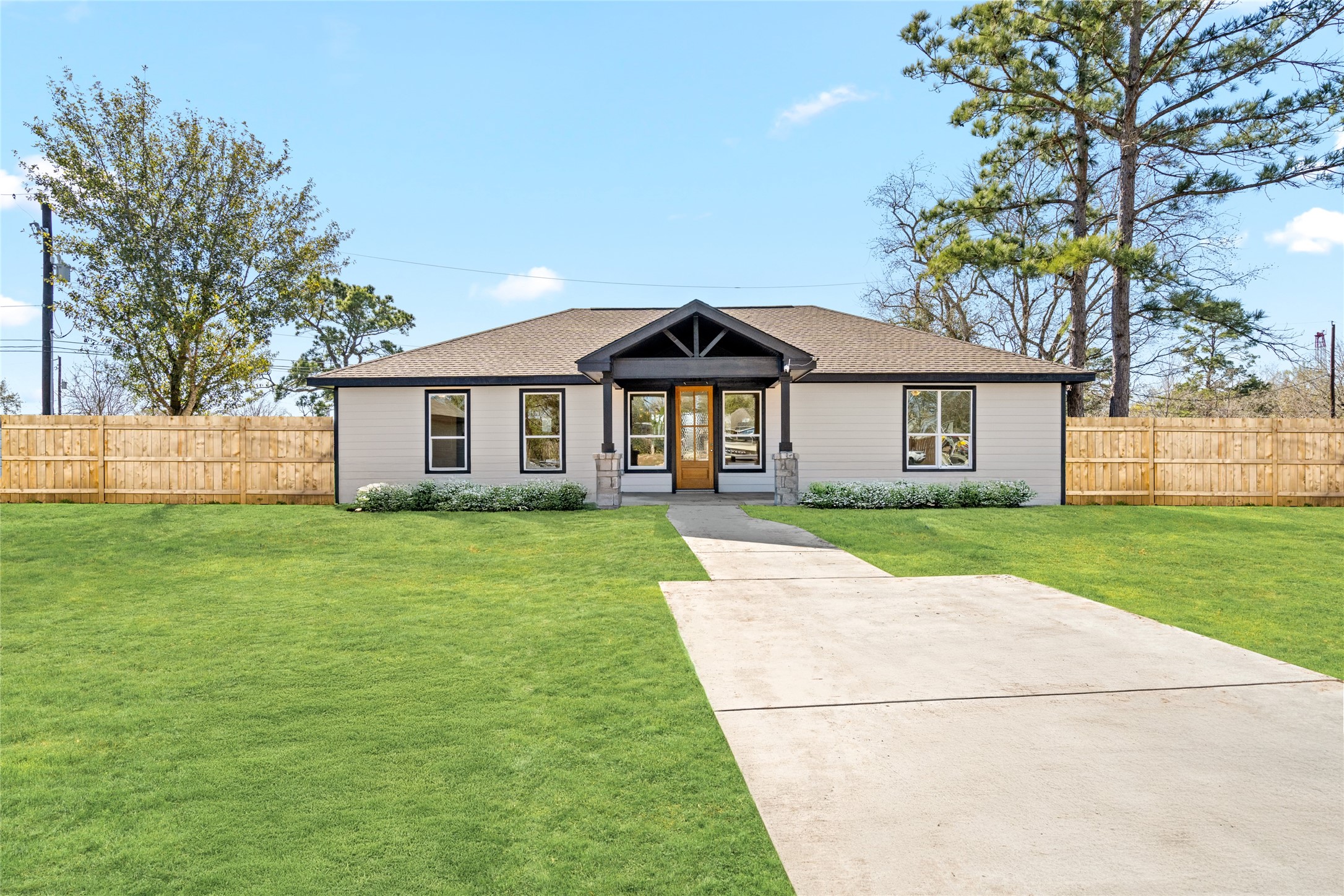 A slightly angled front
perspective captures the
homes balance and
symmetry, inviting guests
into a home that effortlessly
blends contemporary design
with cozy appeal. A slightly angled front
perspective captures the
homes balance and
symmetry, inviting guests
into a home that effortlessly
blends contemporary design
with cozy appeal.