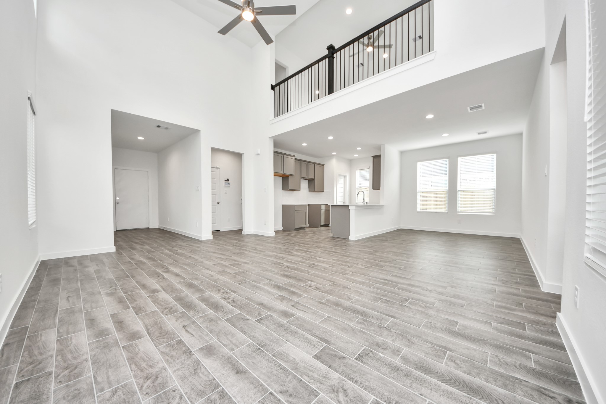 Take another glimpse into the heart of the home with this additional view of the family rooma sprawling space ready to accommodate all your gatherings. Sample photo of completed home with similar floor plan. Actual colors and selections may vary. Take another glimpse into the heart of the home with this additional view of the family rooma sprawling space ready to accommodate all your gatherings. Sample photo of completed home with similar floor plan. Actual colors and selections may vary.