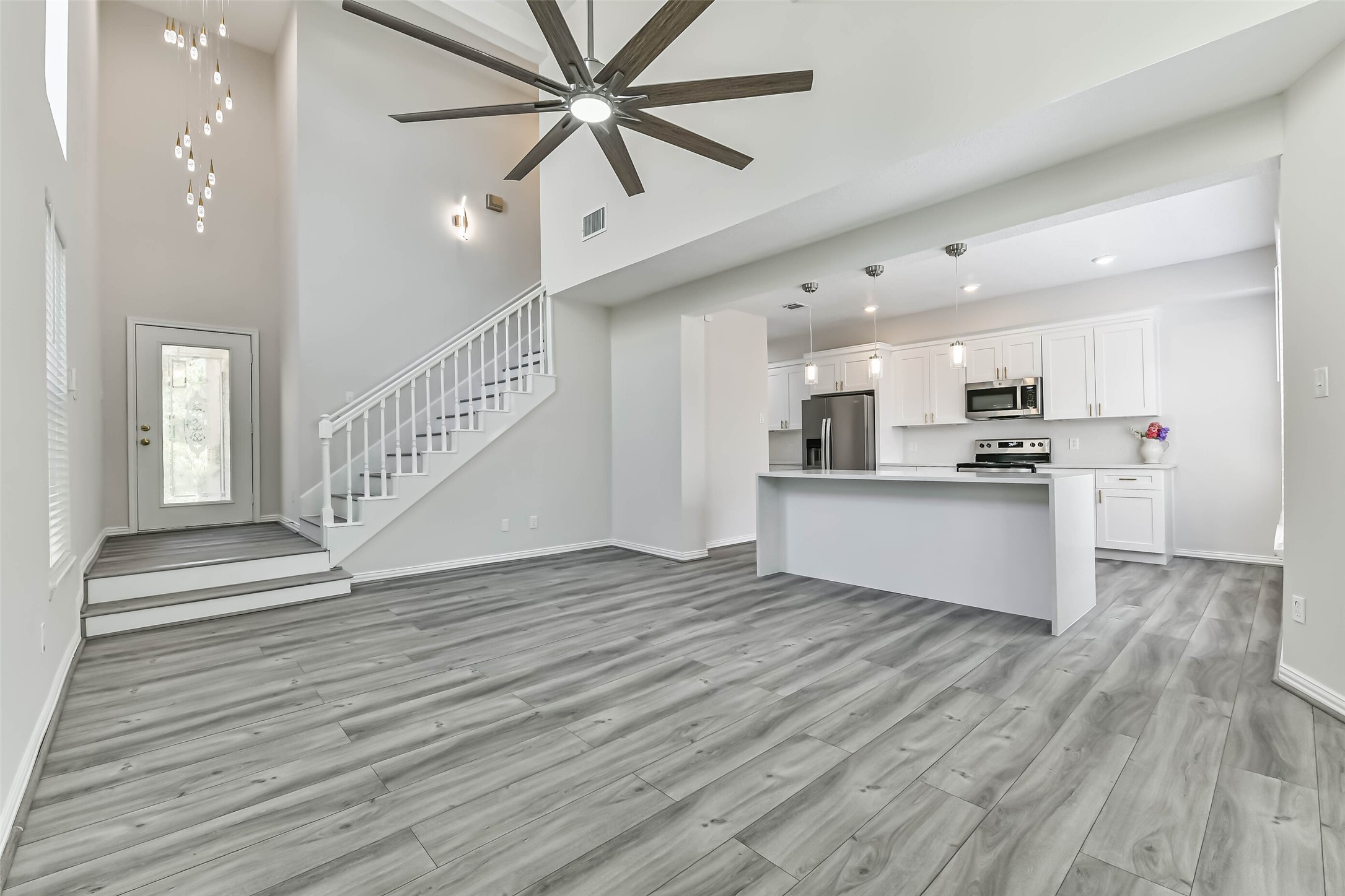 From this angle you can see the kitchen is open to the family room. From this angle you can see the kitchen is open to the family room.