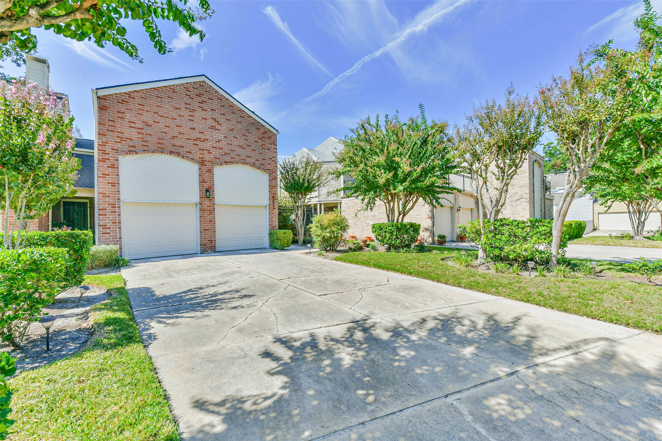 There is a two car attached garage with auto garage door openers. There is a two car attached garage with auto garage door openers.