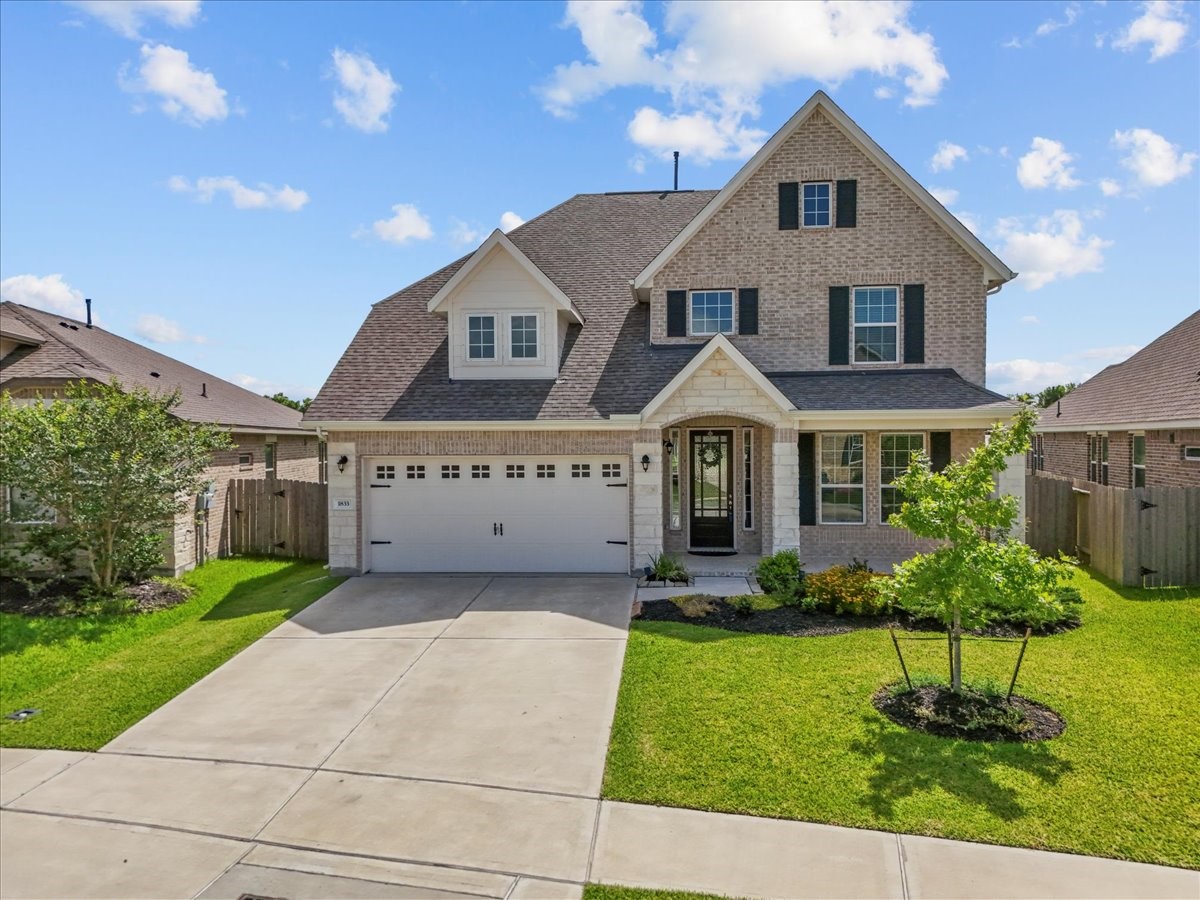Stunning two-story home with brick and stone elevation with no back neighbors and water views Stunning two-story home with brick and stone elevation with no back neighbors and water views