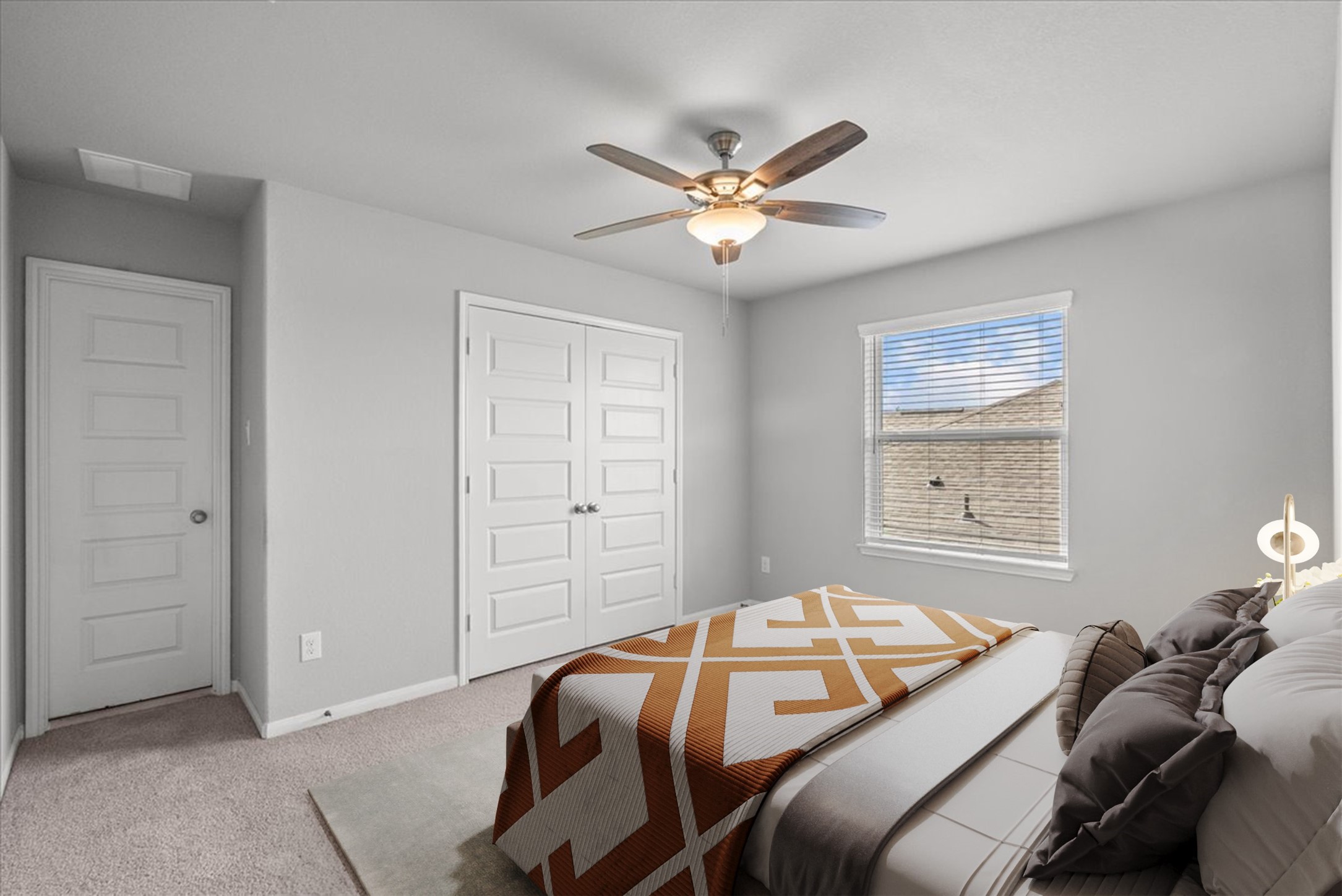 Bedroom 2 located on the second floor with a private en-suite bath
