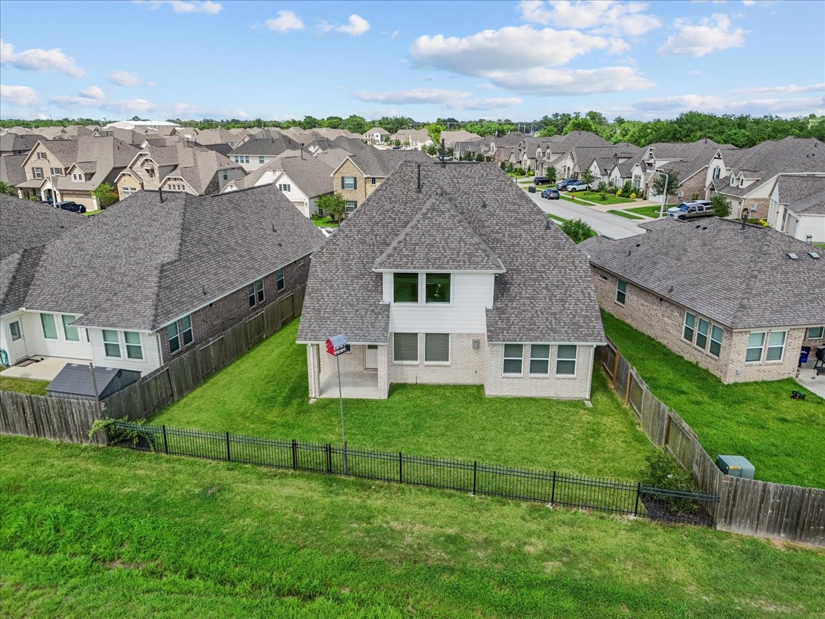 Aerial view of the back of the home