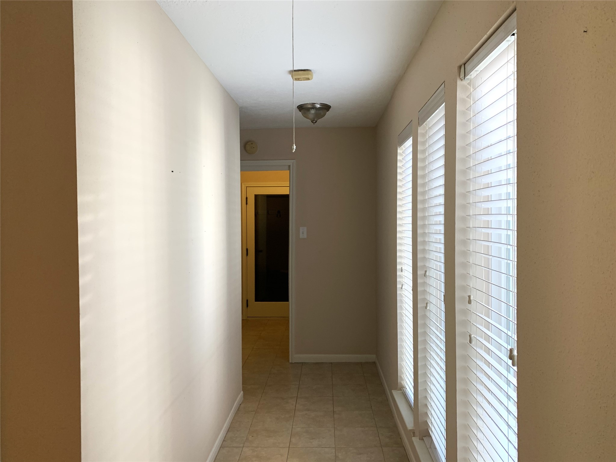 hall to bedrooms, utility and garage