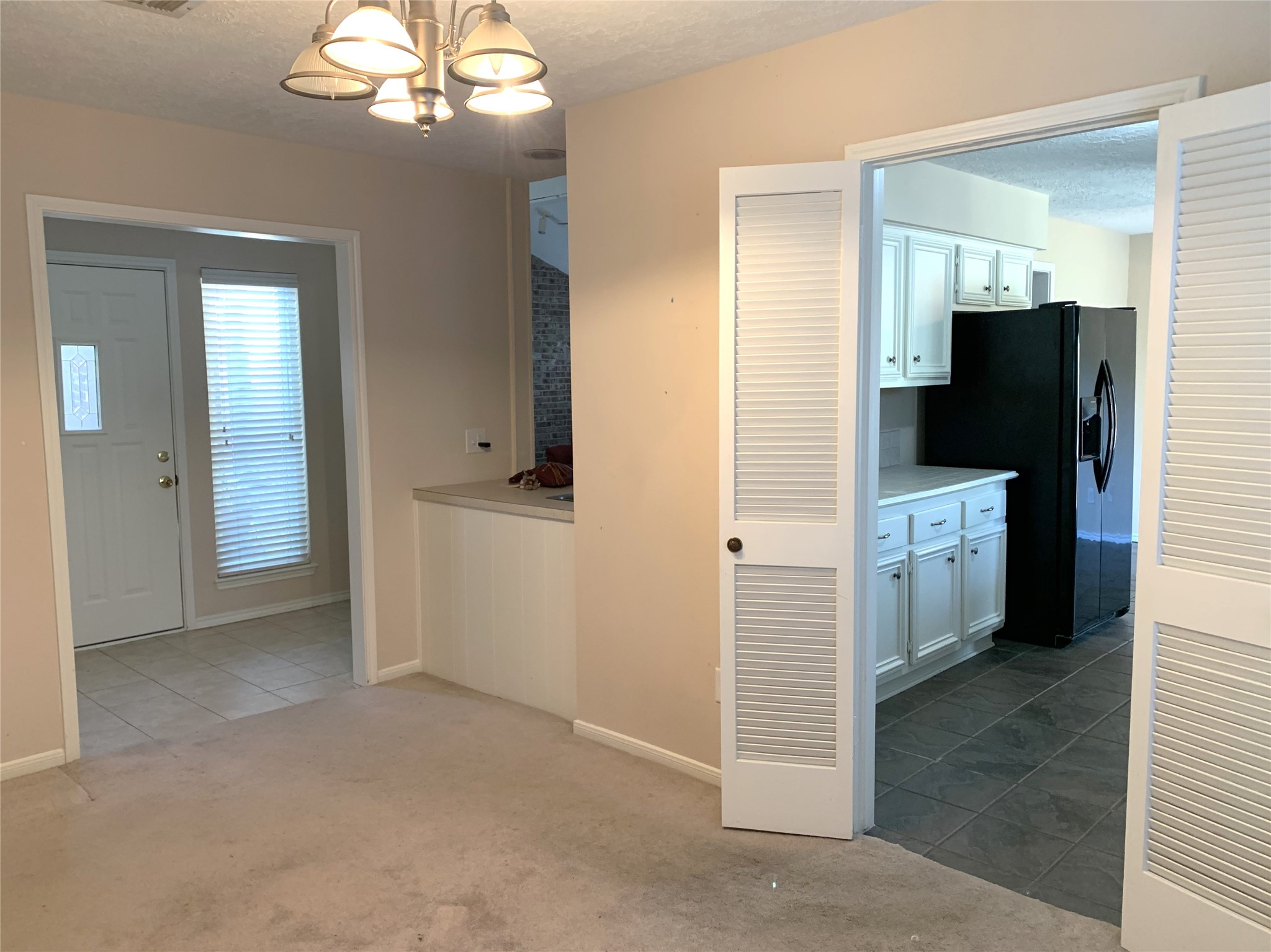 Dining to kitchen and beverage area
