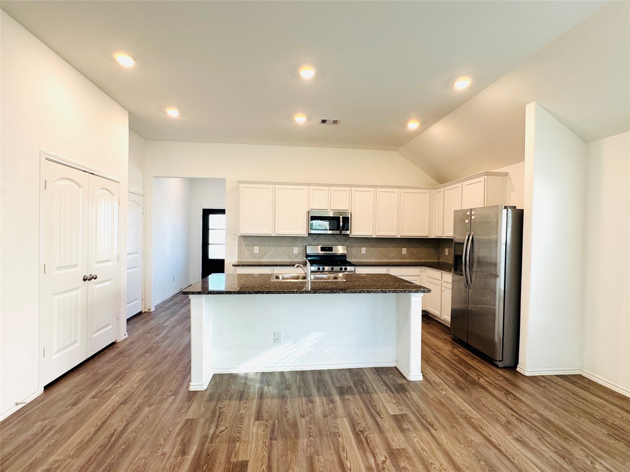 Granite kitchen with SS appliances