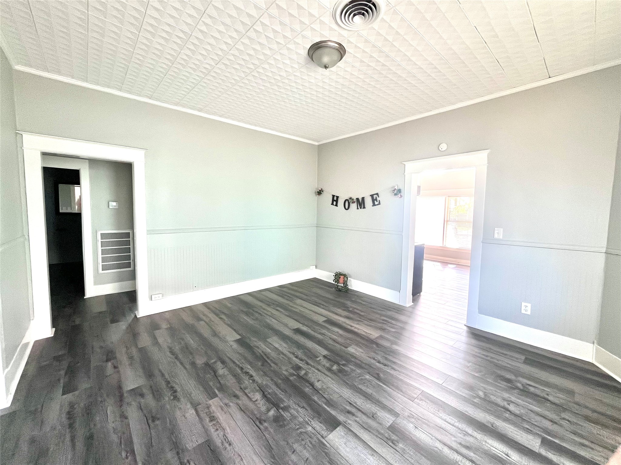 secondary living area looking at hallway and restroom