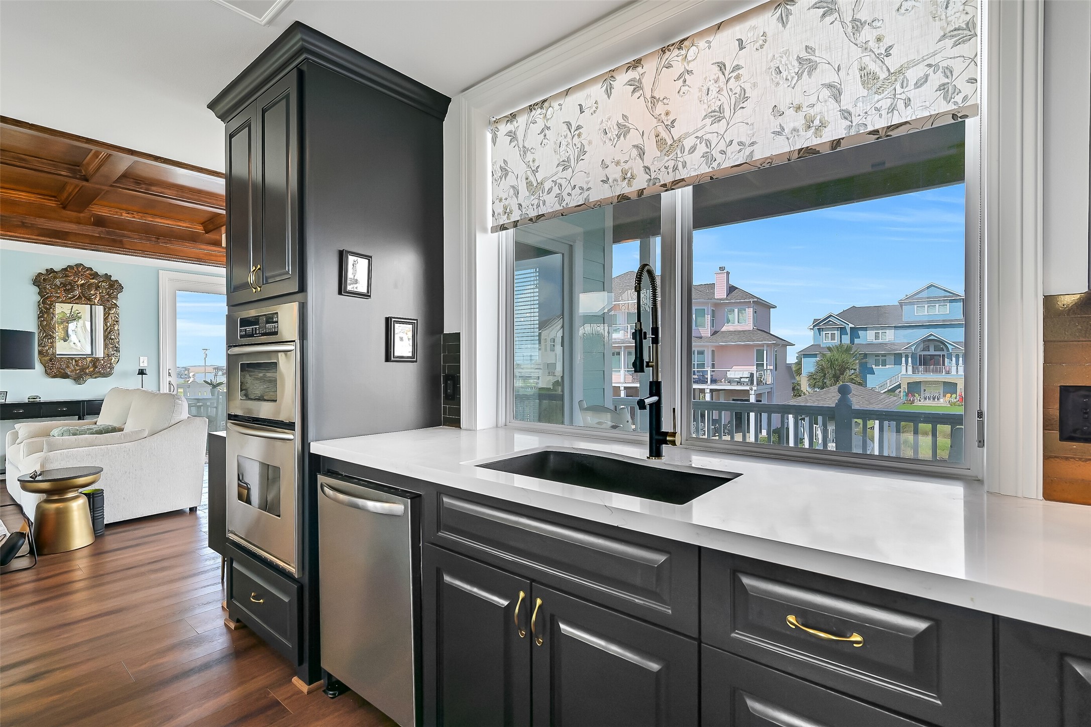 Poured granite sink, bar sink with built-in water filtration, soft-close doors and drawers on every cabinet in the home. The details here are what separate a renovation from a reimagination.