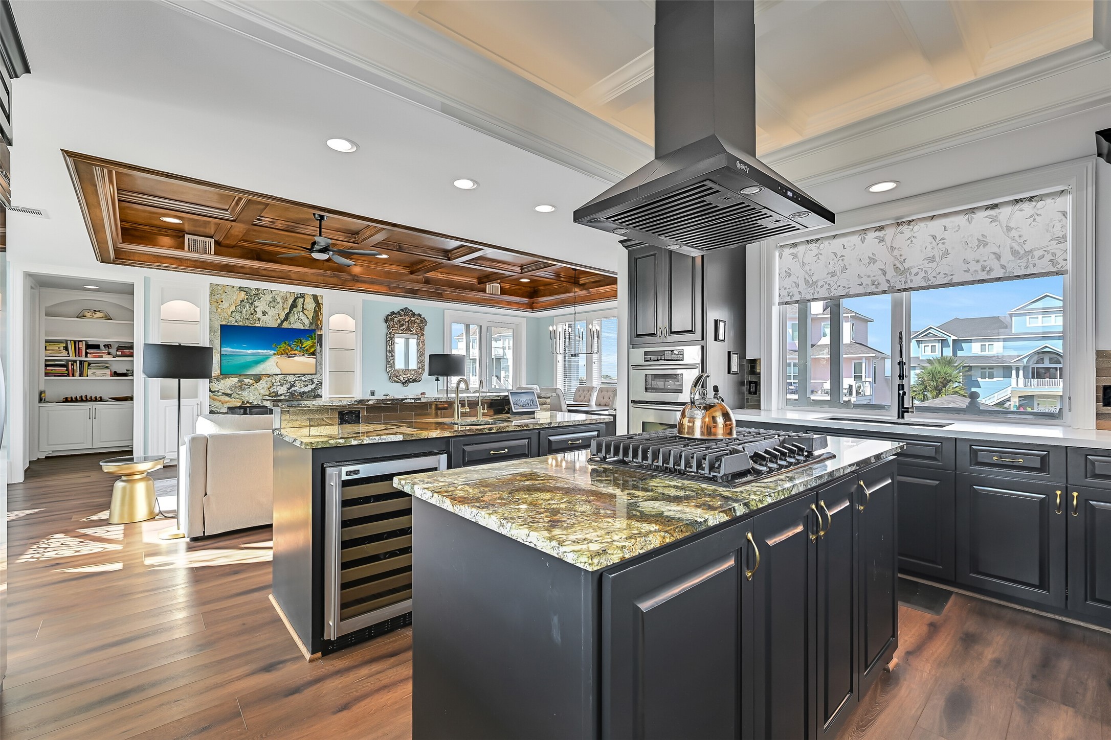 Cook with a water view. The open-concept kitchen flows directly to the dining area and connecting balconies  so the Gulf Coast lifestyle is always part of the experience.
