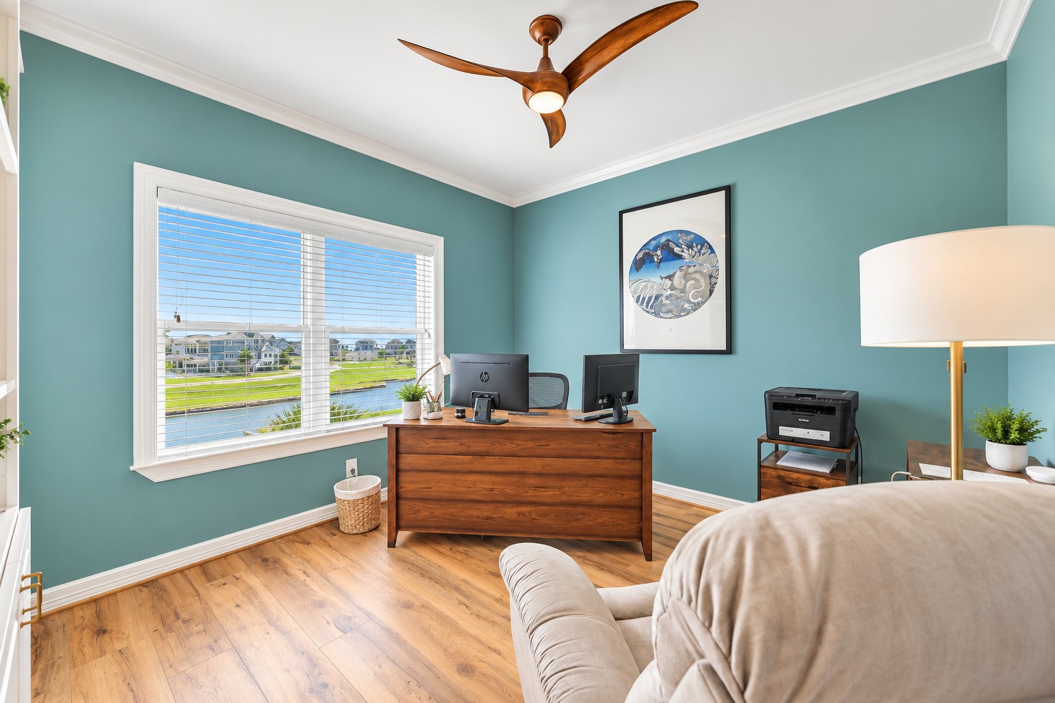 Currently used as a home office, this versatile fourth bedroom on the third floor offers the flexibility today's buyers are looking for. Stunning water views, new plush Shaw carpet, designer paint, and custom built-ins make it just as functional as a private study, game room, or additional guest space. Whether you work from home or just want a quiet retreat above the water, this room adapts to fit your life.