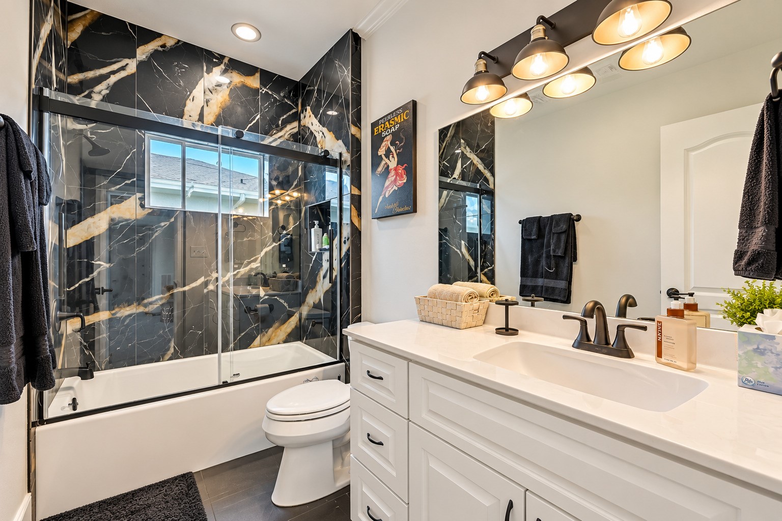 No detail was overlooked in the second guest bath. Custom tile, new Pfister plumbing fixtures throughout, and a fresh modern finish that ties seamlessly into the overall luxury aesthetic of the home. Function and beauty in equal measure.