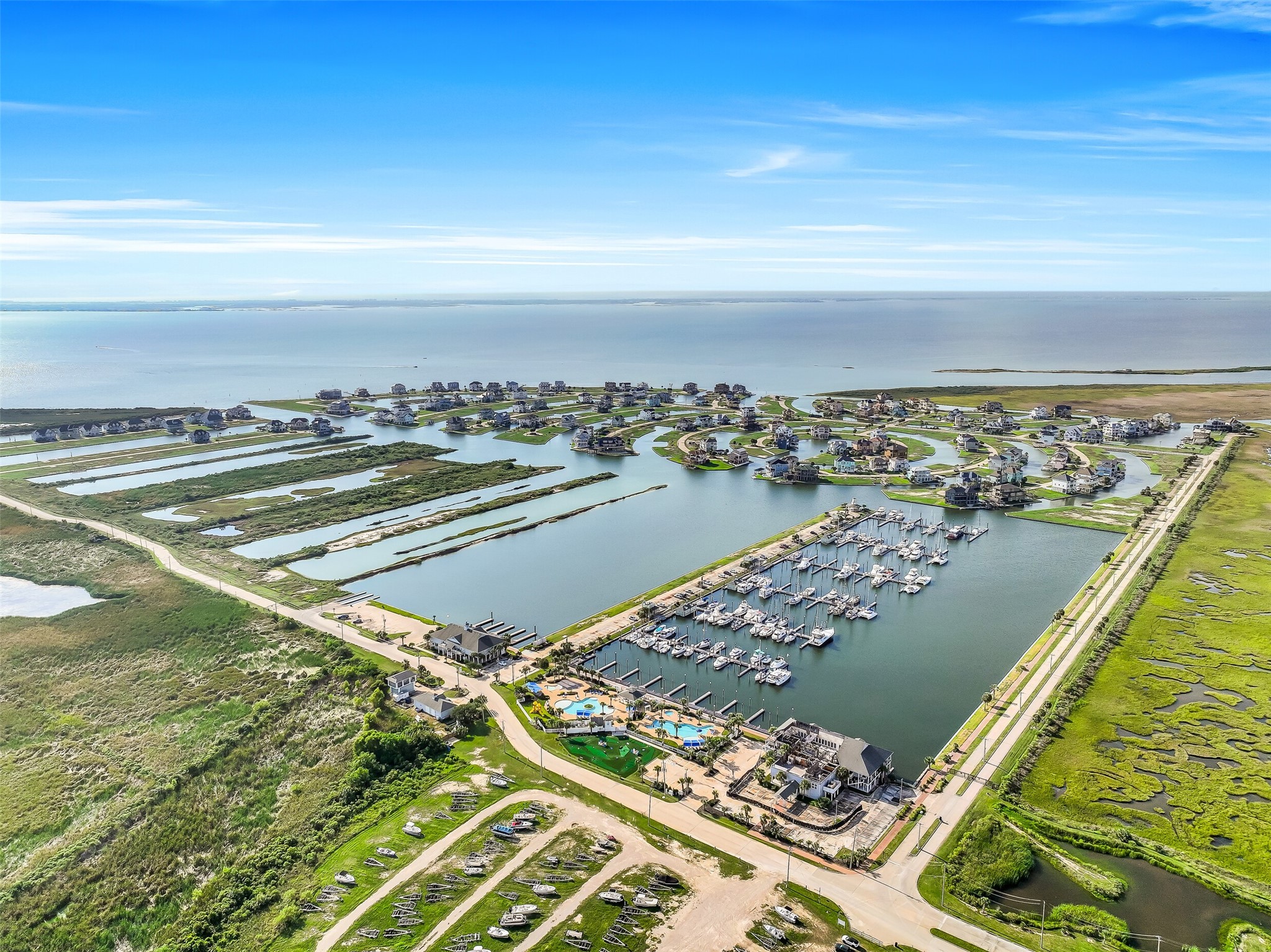 There is no better way to end the day than watching the Gulf Coast sky turn gold from above the water. The aerial view of 12 Fleming at golden hour captures everything this property offers  the canals, the community, the open sky, and a home that was built to be lived in fully. Come see it in person. The view from inside is even better.