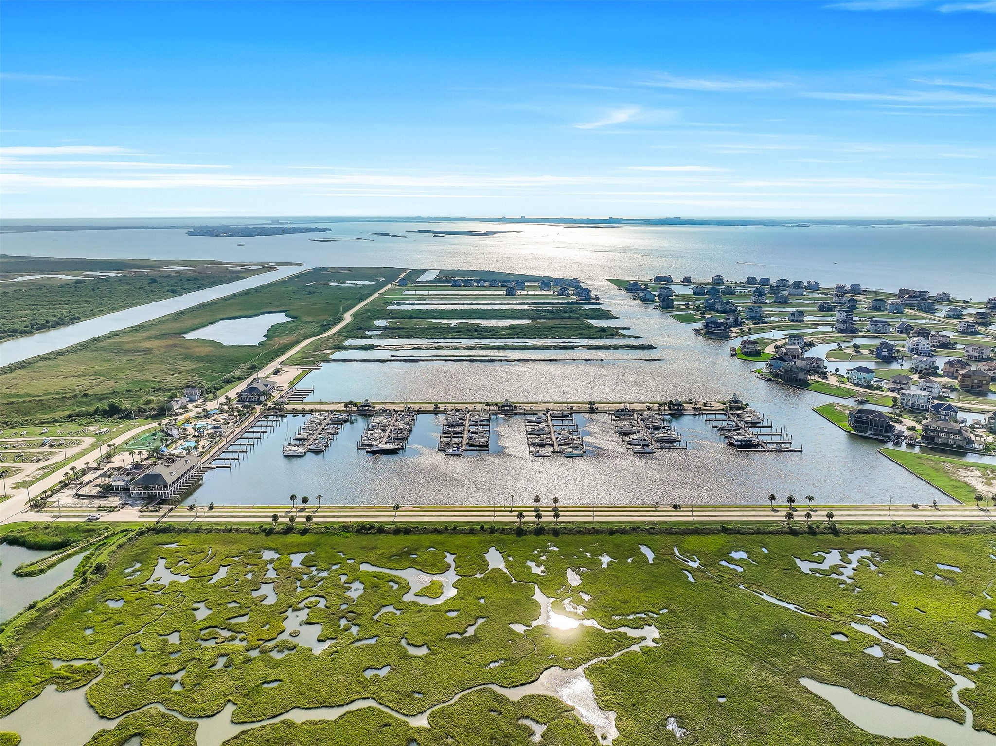 Every boat owner's dream from every angle. The aerial shot of 12 Fleming shows exactly what direct canal-front living looks like  private boathouse, rebuilt dock, and a straight shot to the Intracoastal Waterway and beyond. The water is not just a view here. It is your backyard, your marina, and your highway to the Gulf.