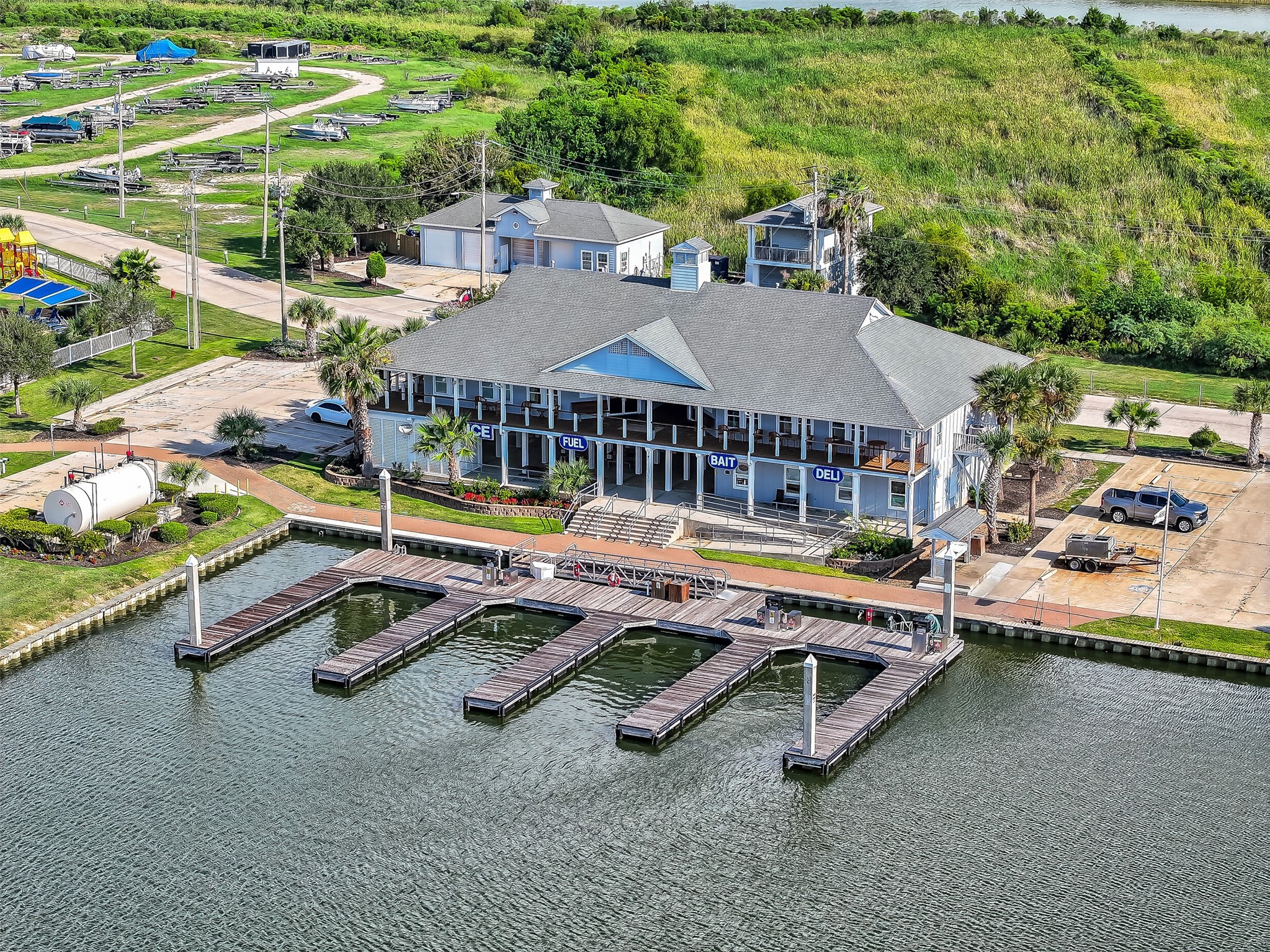 From up here you can see the full picture  the canals, the community, the marina, the open water beyond, and right in the middle of it all, 12 Fleming. A completely reimagined luxury waterfront home in one of Galveston County's most sought-after gated communities. The aerial view just confirms what buyers already know  this is exactly where they want to be.