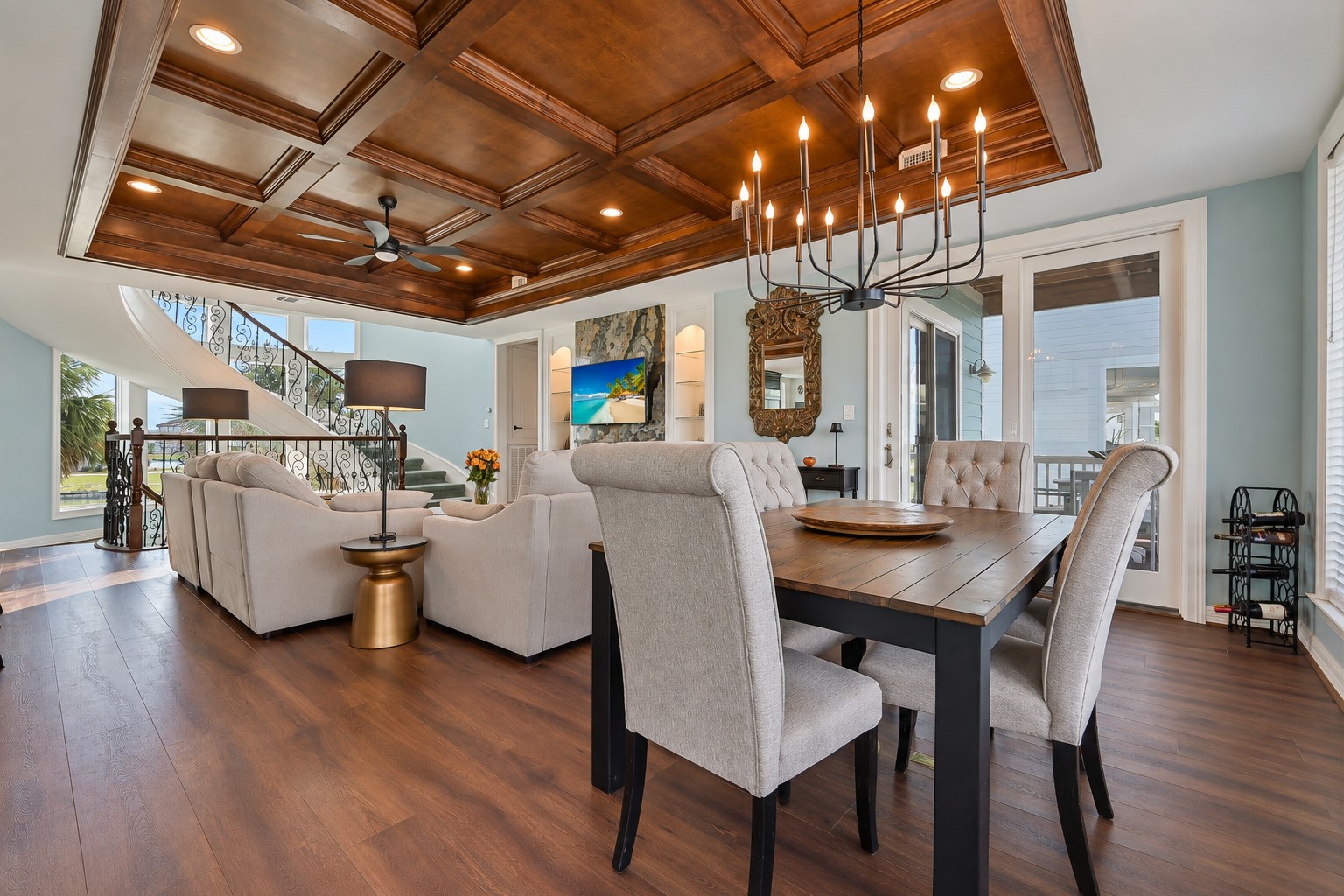This dining room was designed for the way people actually gather. Wide open to the kitchen on one side and the balcony on the other, it moves effortlessly from casual weeknight dinners to full weekend entertaining. Updated luxury wide-plank flooring, designer paint, and custom woodwork throughout make the space as beautiful as it is functional.