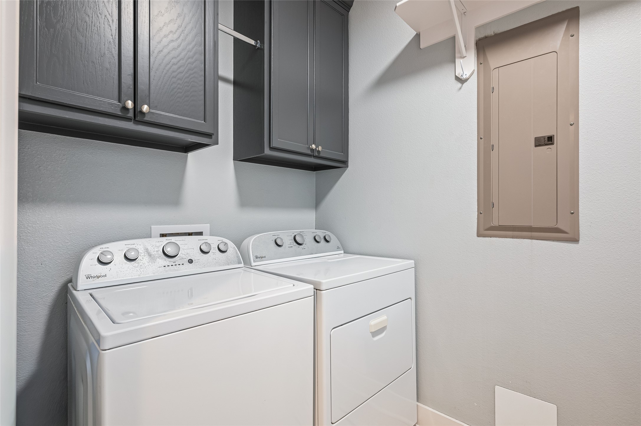 Utility room with washer and dryer