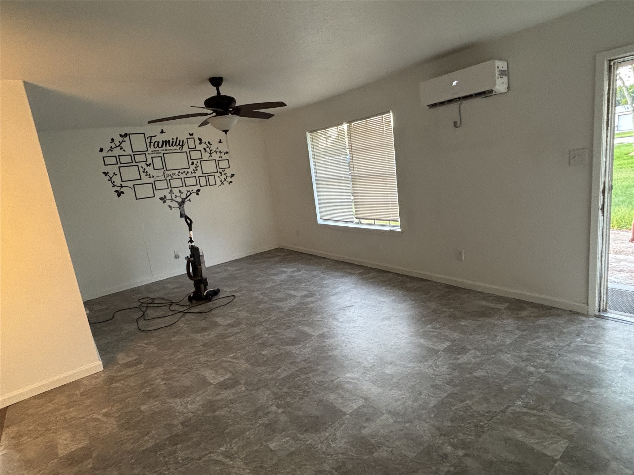 Living room with updated flooring.
