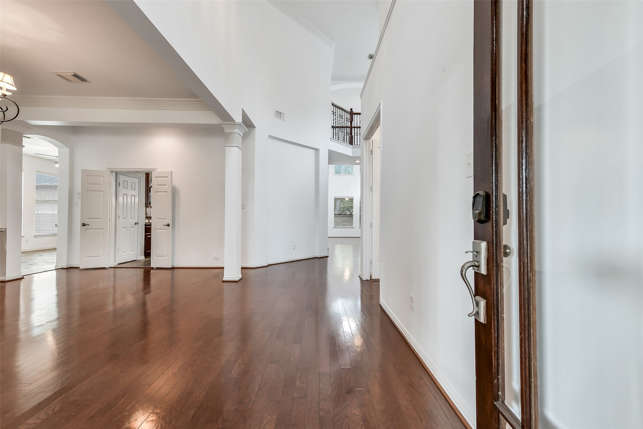 Upon entering, you're greeted by soaring ceilings and a formal dining room that flows seamlessly into the chef's kitchen.