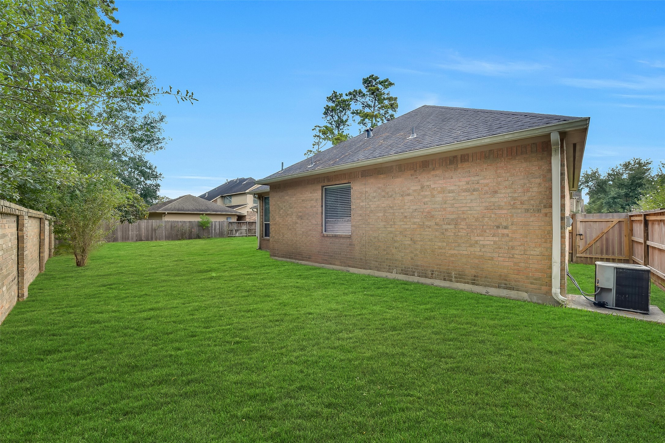 Highlighting the home's incredible lot size, this expansive backyard easily fits a garden and play area with a swing-set or trampolineall while leaving generous main yard space reserved for a future pool.