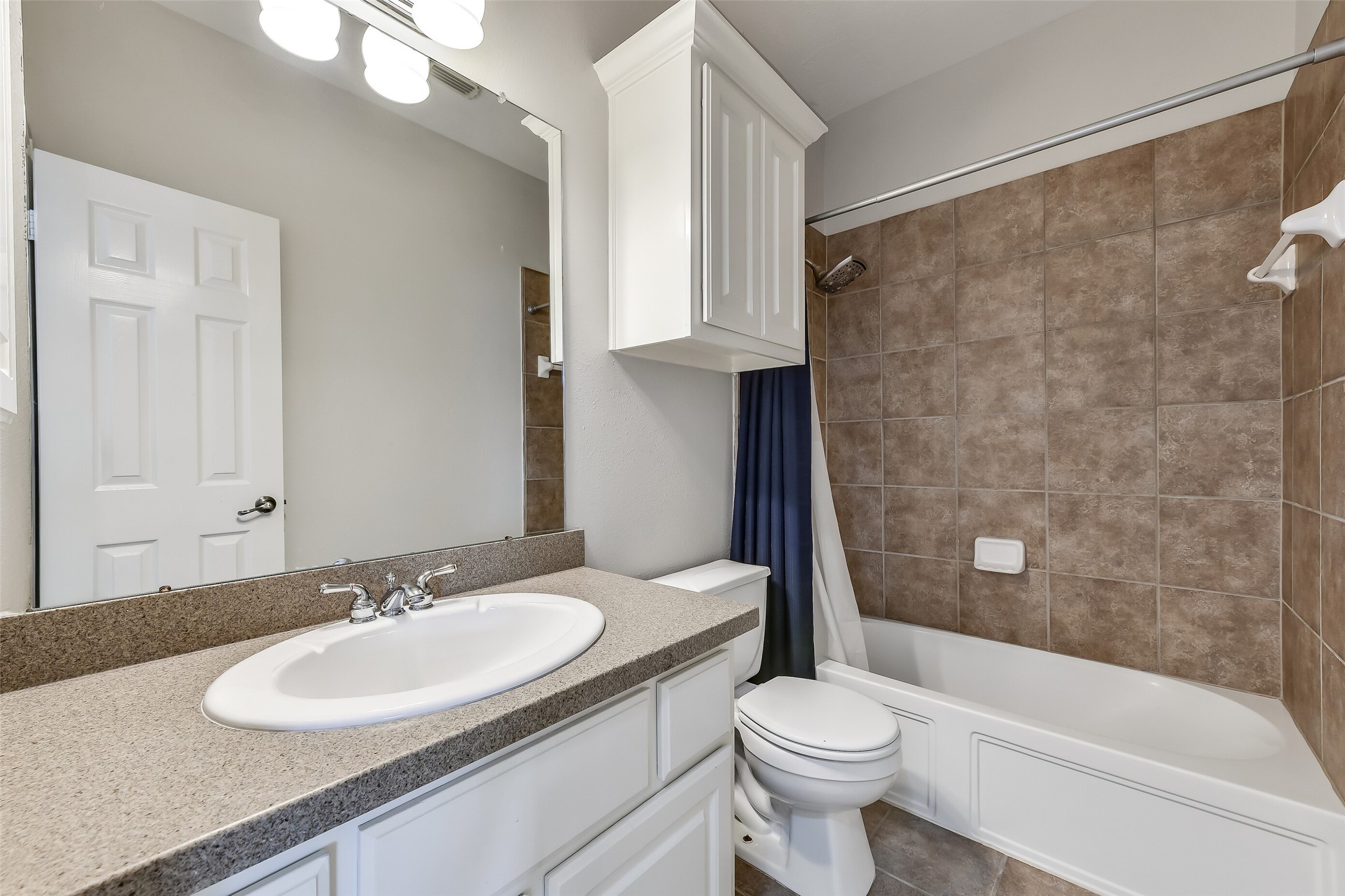 Fourth full bathroom serving the game-room and 5th bedroom.