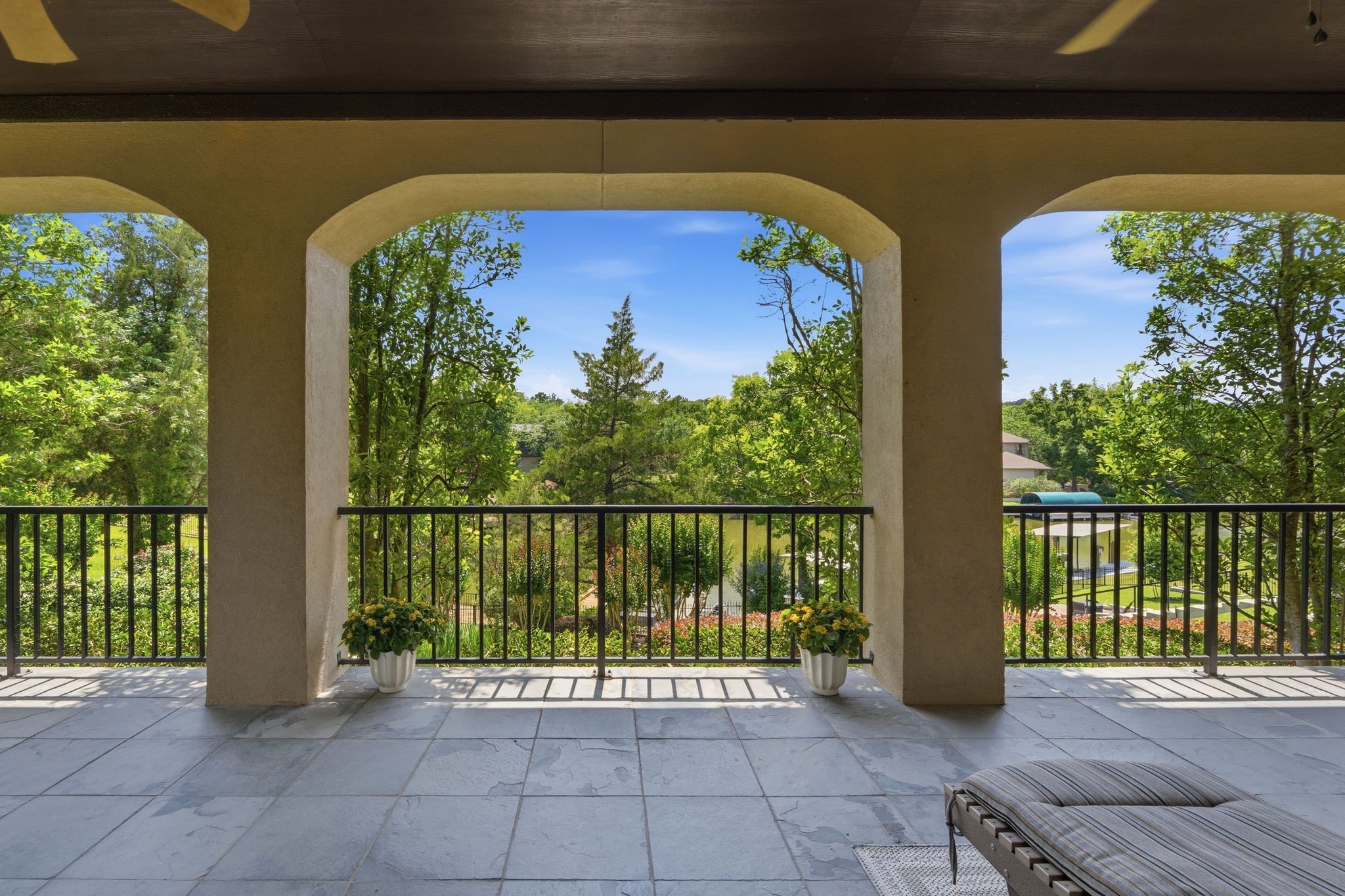 Covered Back Patio Extends the Length of the House.  Scenic Views All Year Long!