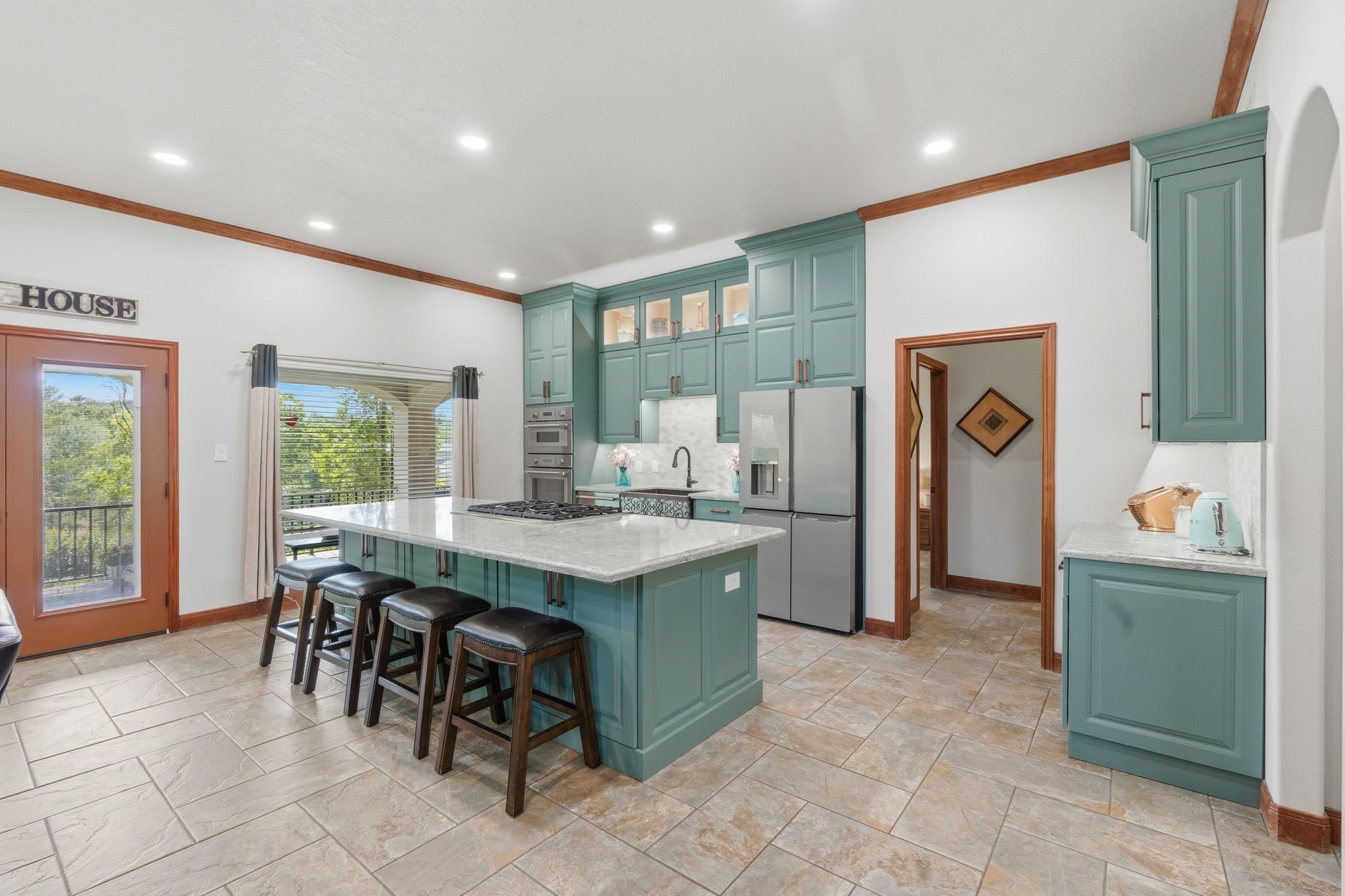 Custom Kitchen- 6 Burner Thermador Gas Cooktop, Additional Storage Under the Oversized Island and more!